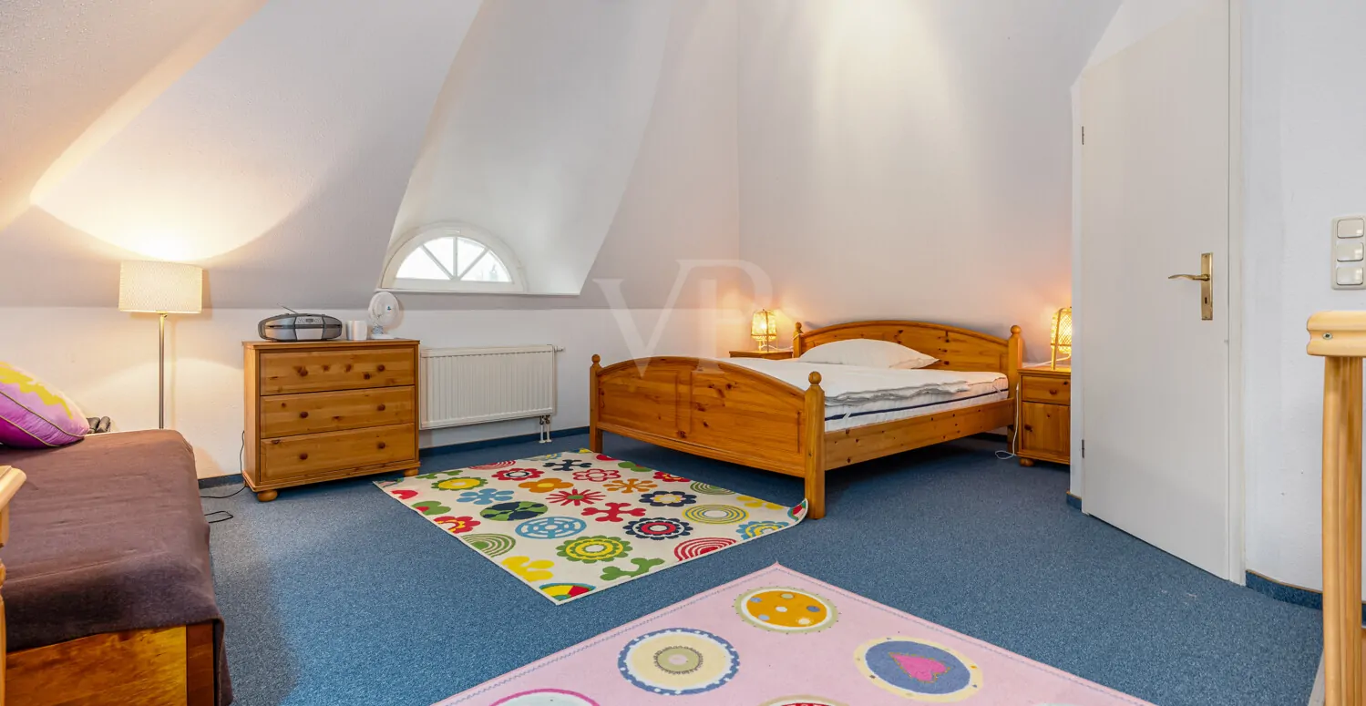 Schlafzimmer Spitzboden