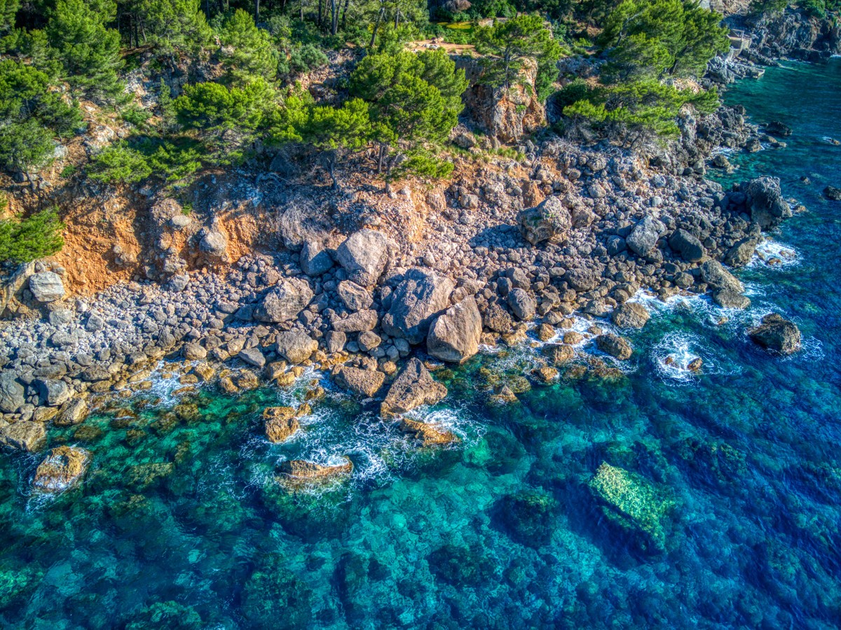 Vast and breathtaking coastal landscape in the first line of the sea in the heart of the Unesco World Heritage Tramuntana between Cala Tuent and Soller