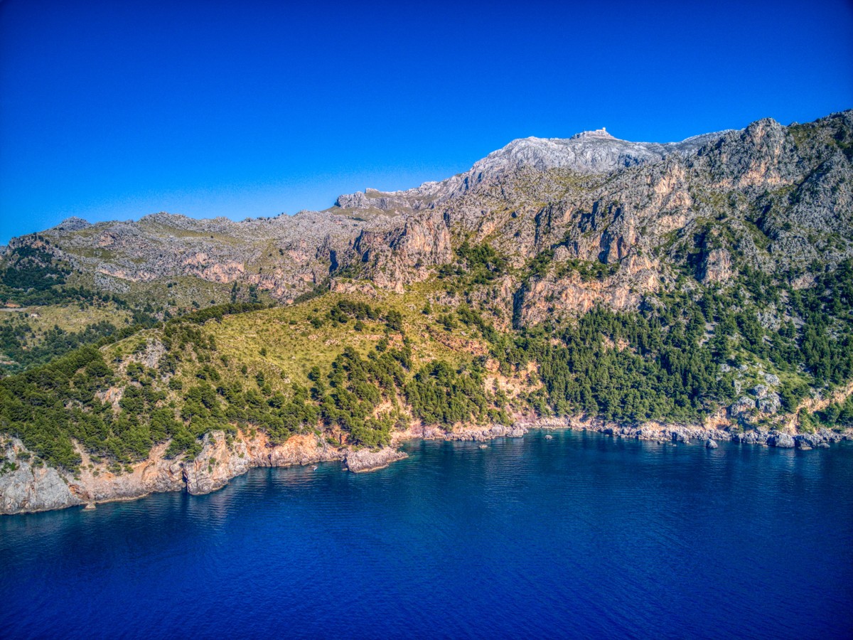 Vast and breathtaking coastal landscape in the first line of the sea in the heart of the Unesco World Heritage Tramuntana between Cala Tuent and Soller