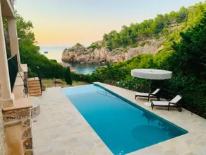 Magnificent villa with pool and open sea views on a coastal hillside in Deià, Mallorca