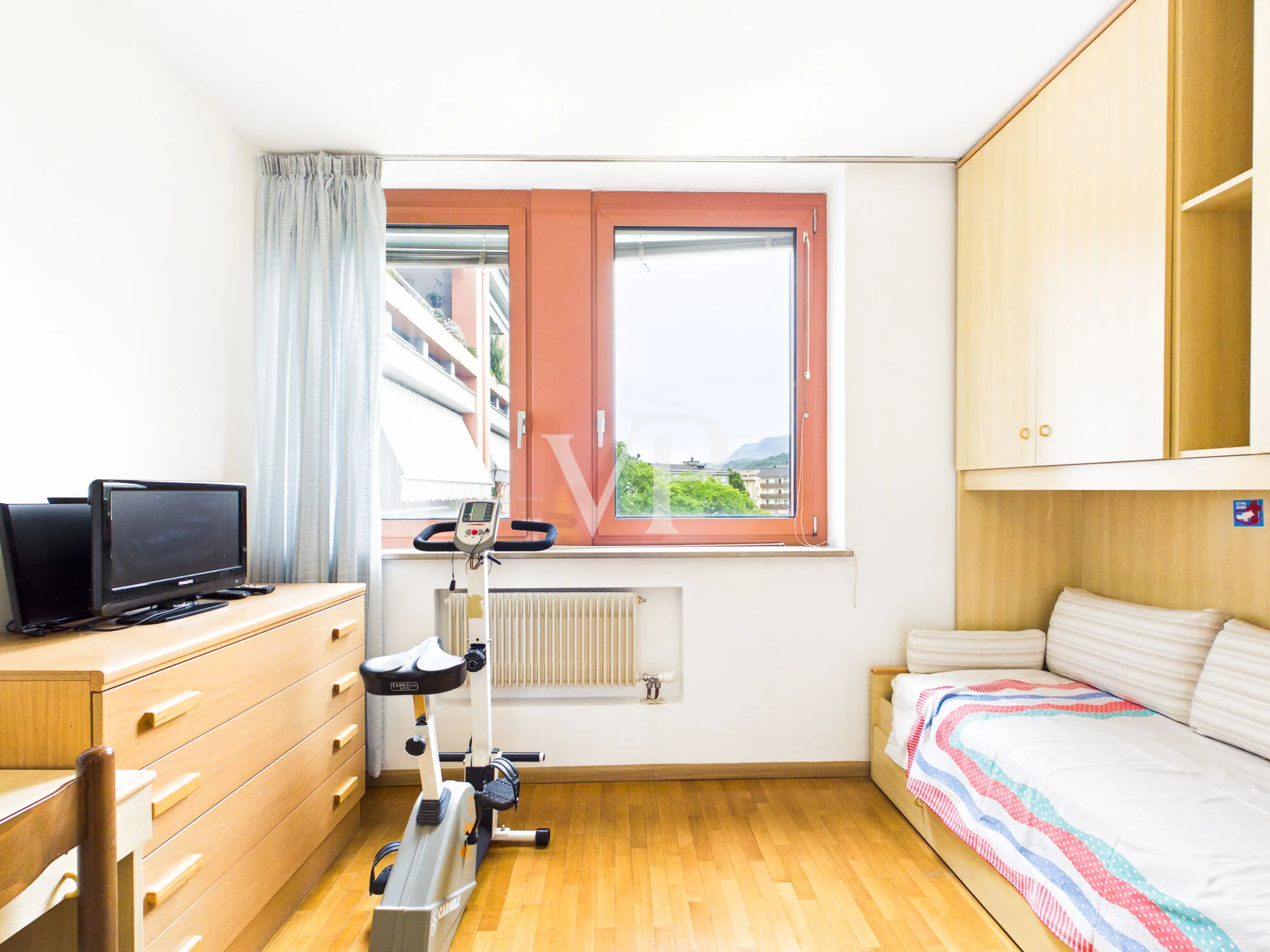 Spacious four-room apartment with a terrace and garage in a quiet, inland location