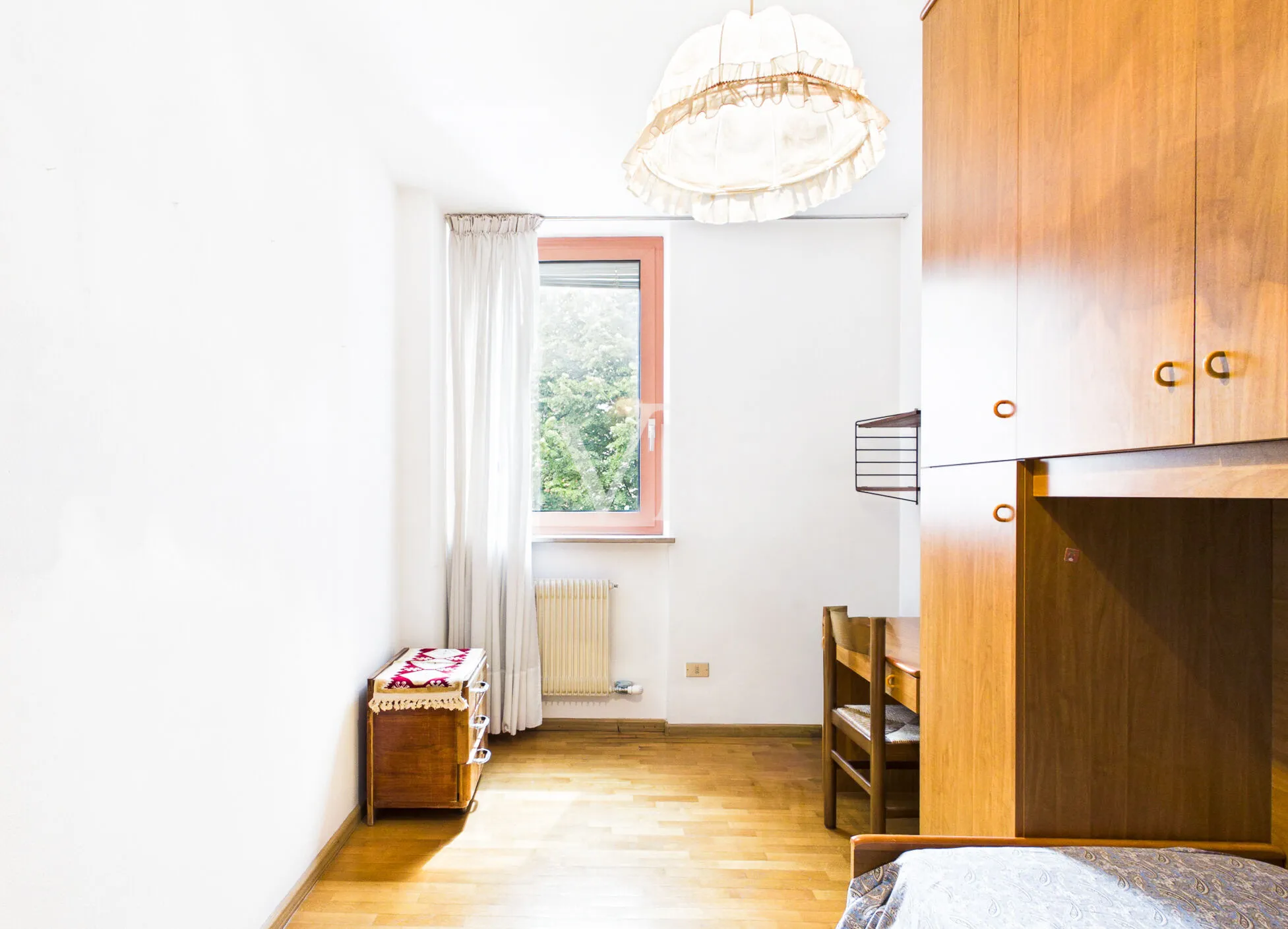Spacious four-room apartment with a terrace and garage in a quiet, inland location