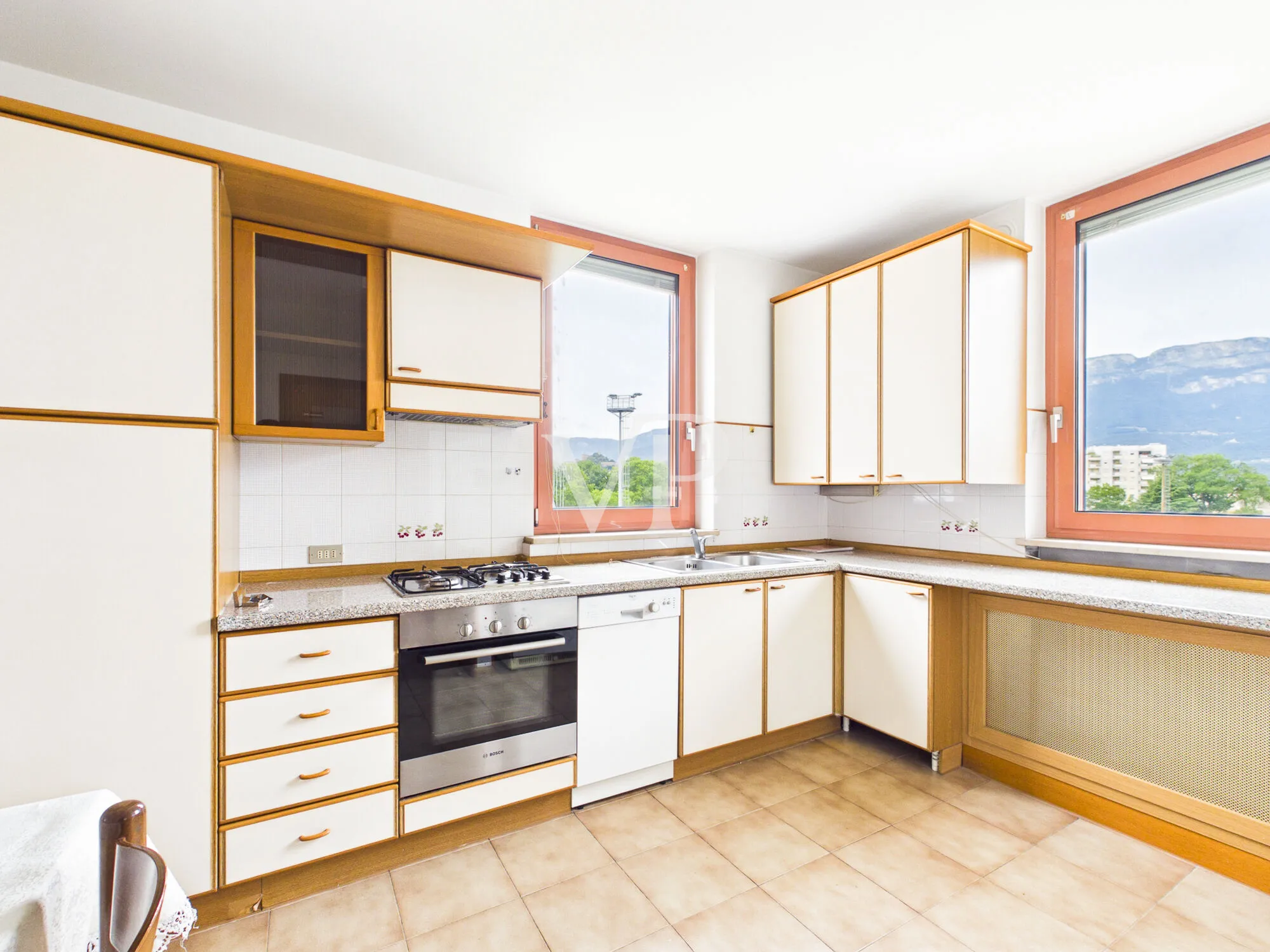 Spacious four-room apartment with a terrace and garage in a quiet, inland location