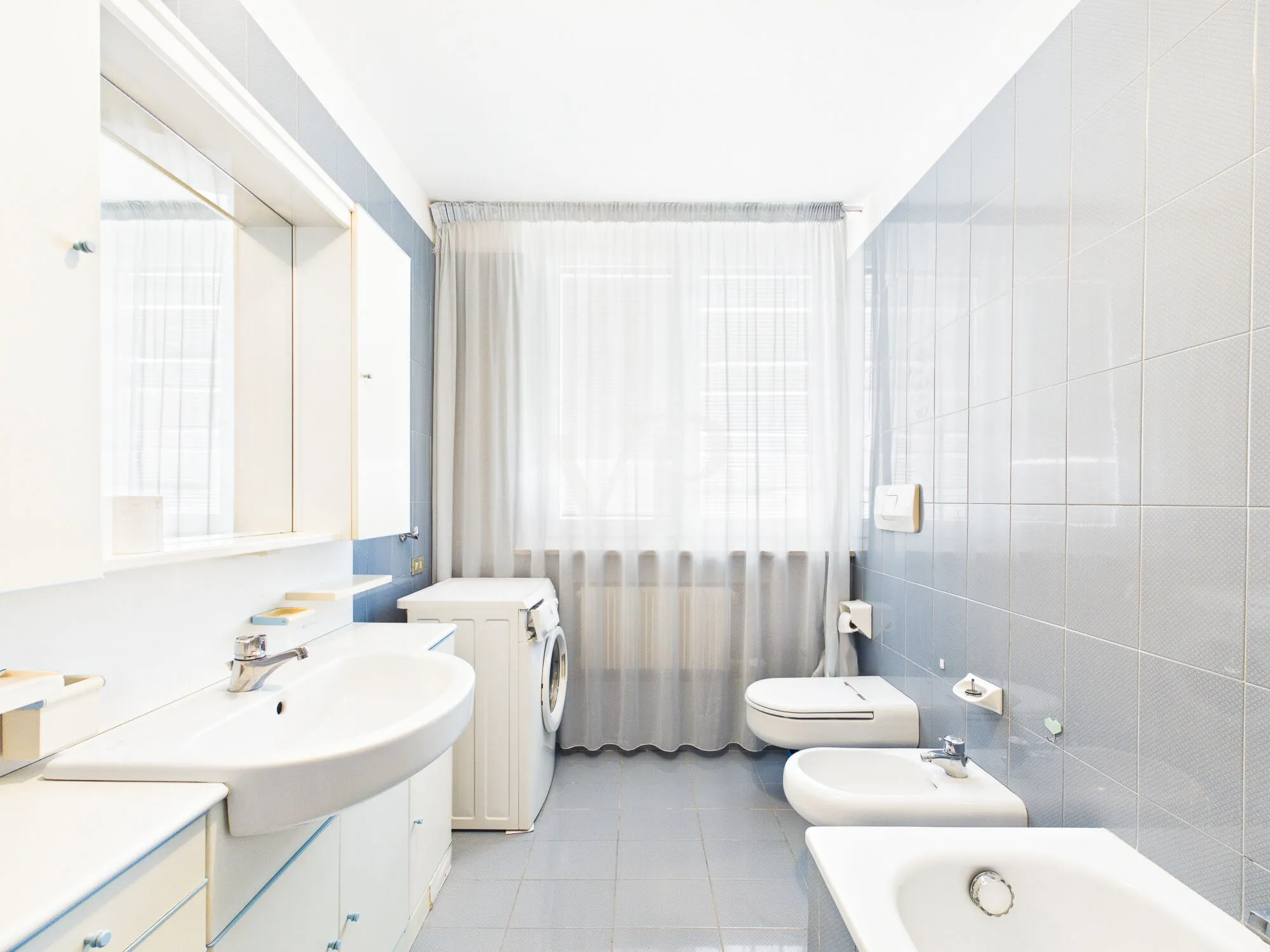 Spacious four-room apartment with a terrace and garage in a quiet, inland location