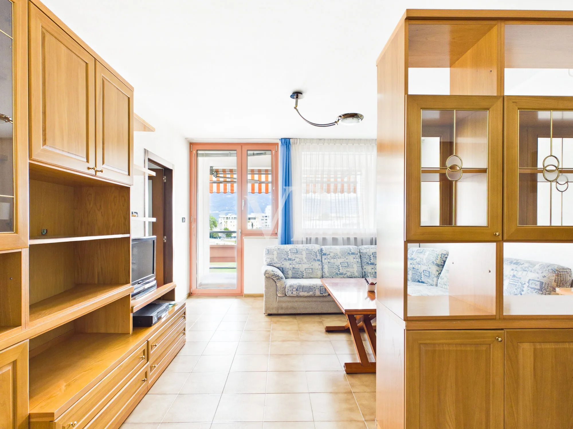 Spacious four-room apartment with a terrace and garage in a quiet, inland location