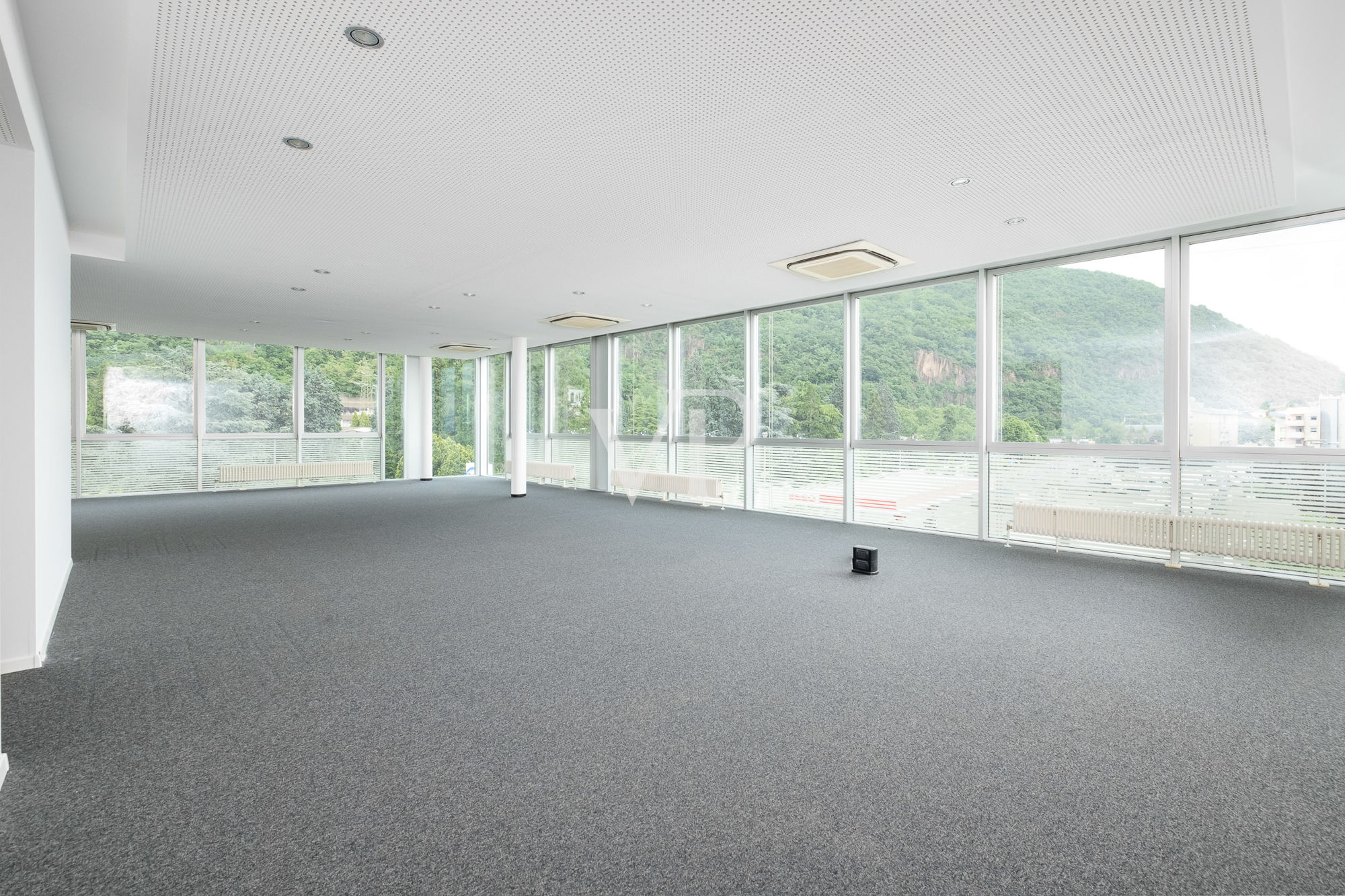 Bright Office with Large Windows and Three Parking Spaces in Garage