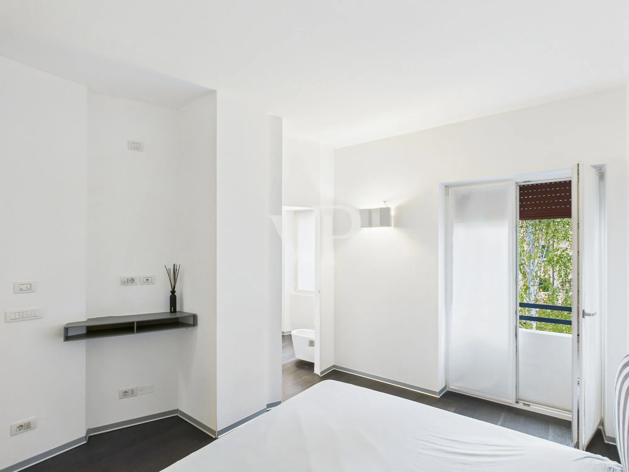 Elegante ático con jardín privado y vistas al Catinaccio