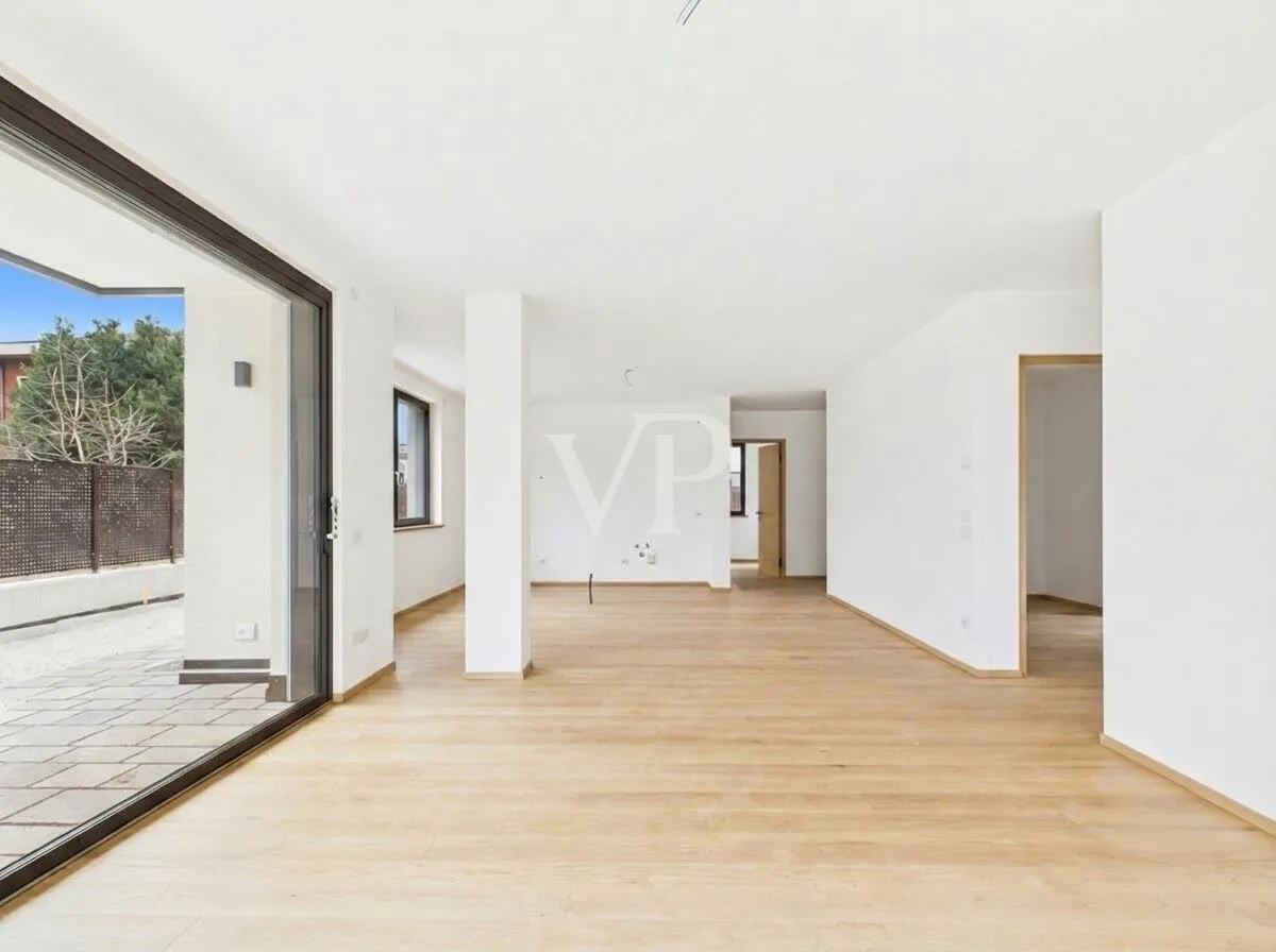 B/1: Moderne und geräumige Vier-Zimmer-Wohnung mit privatem Garten