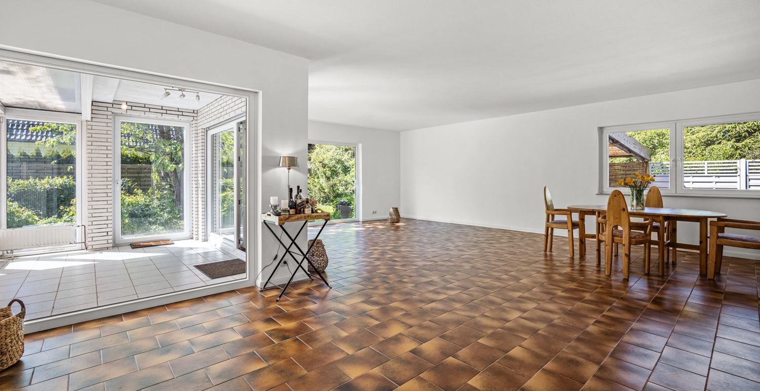 Wohnzimmer mit Wintergarten