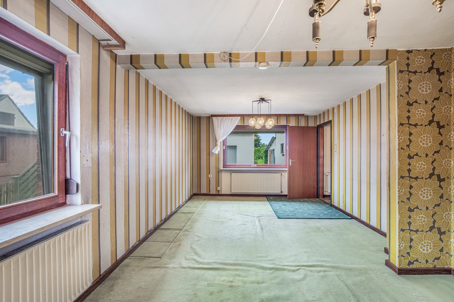 Wohn- und Esszimmer im Erdgeschoss (Ansicht II)