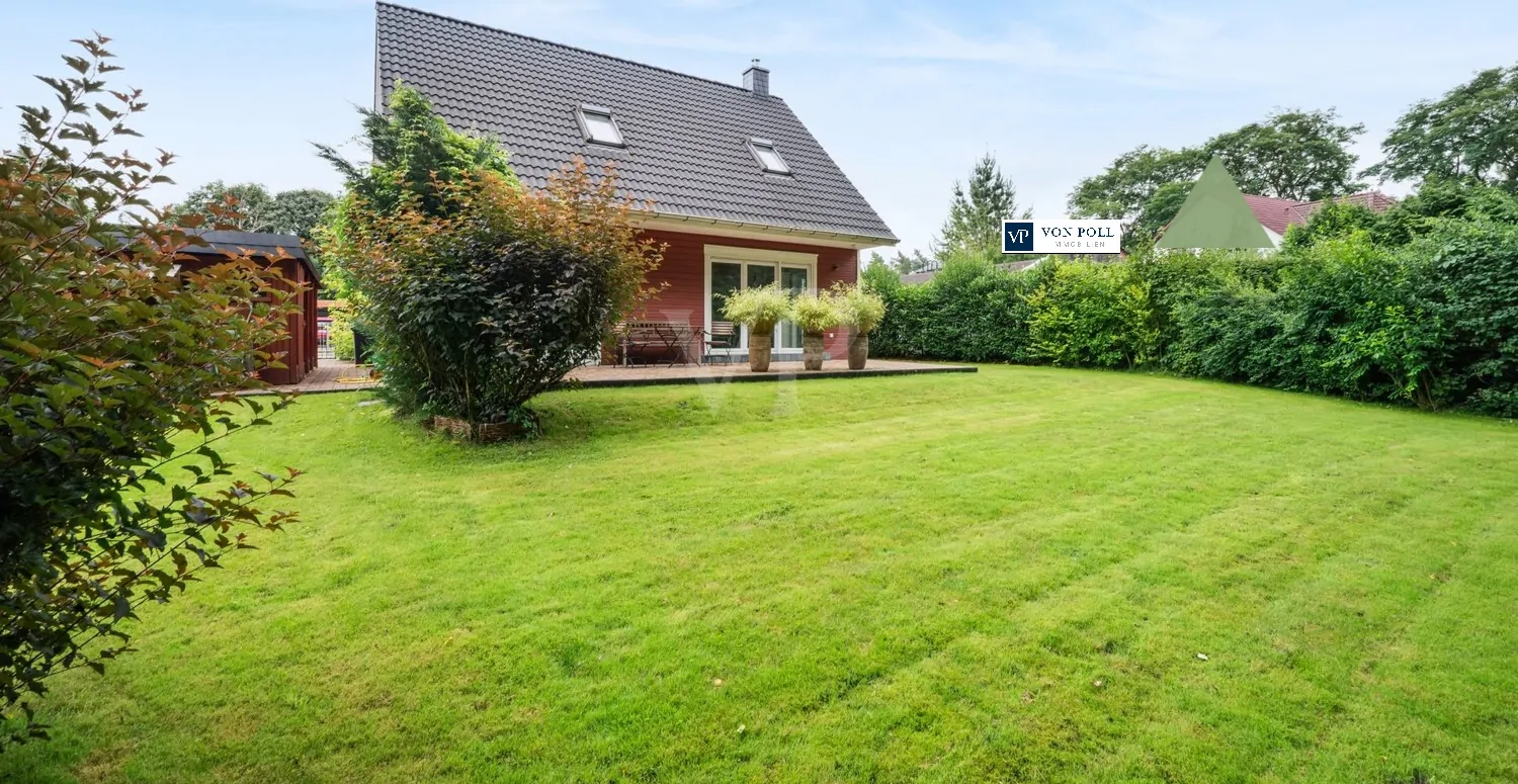 Hausansicht mit Garten