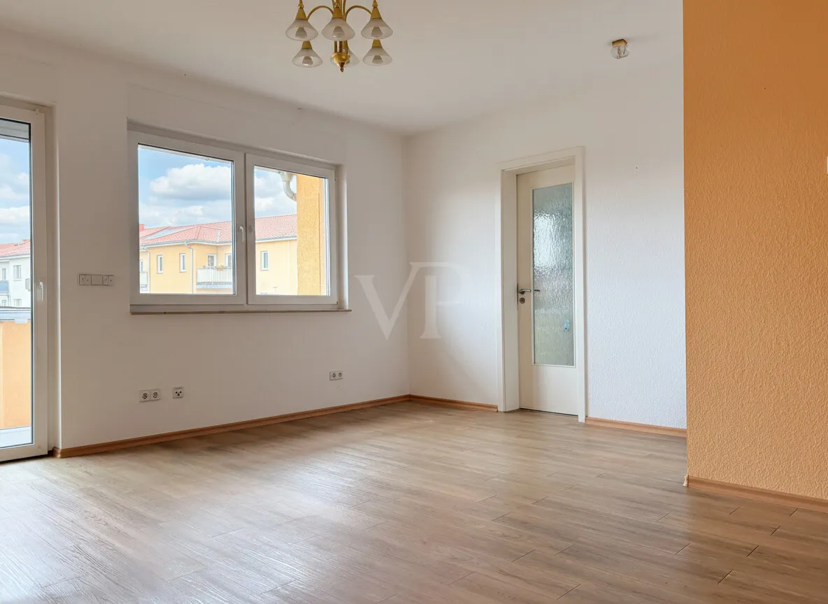 Wohnzimmer und Eingang zur Küche