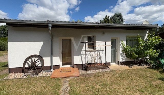 Nebengelass mit Büro und Einliegerwohnung
