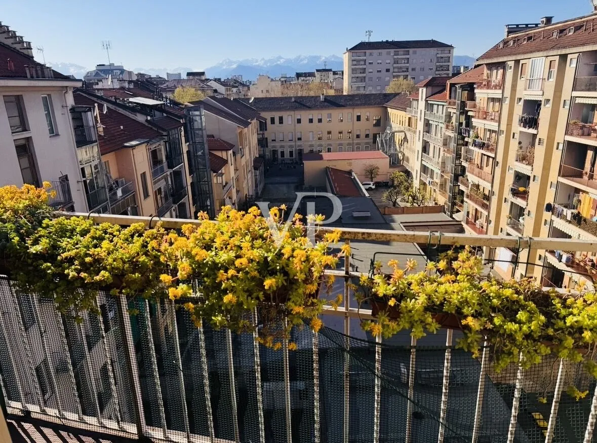 Prestigious penthouse with panoramic terrace overlooking the Mole Antonelliana and the Alpine Arch