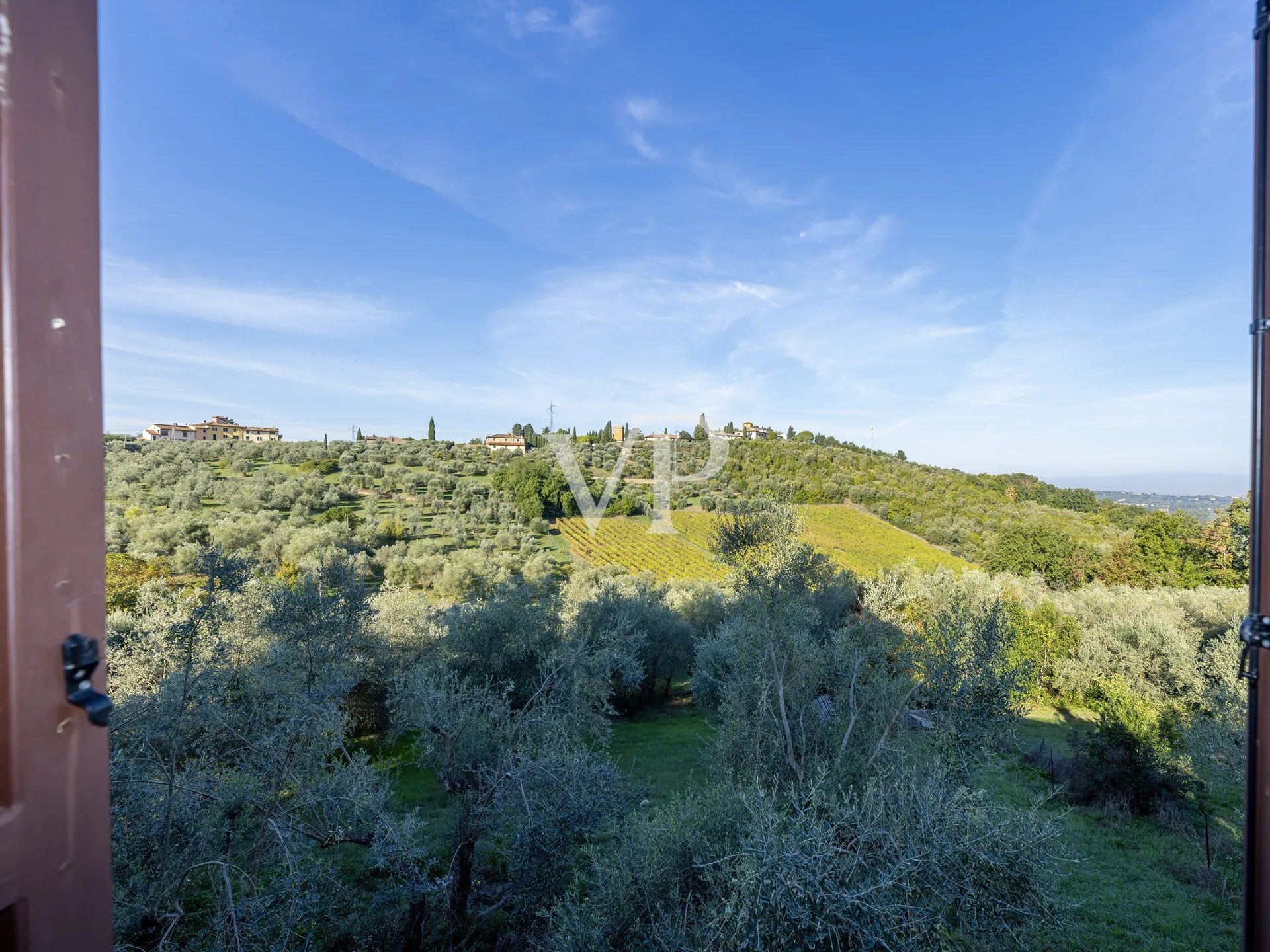 Finca de prestigio con villa, almazara y piscina panorámica a las afueras de Florencia