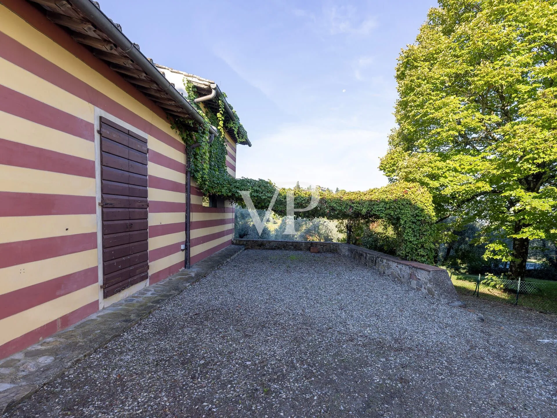 Finca de prestigio con villa, almazara y piscina panorámica a las afueras de Florencia