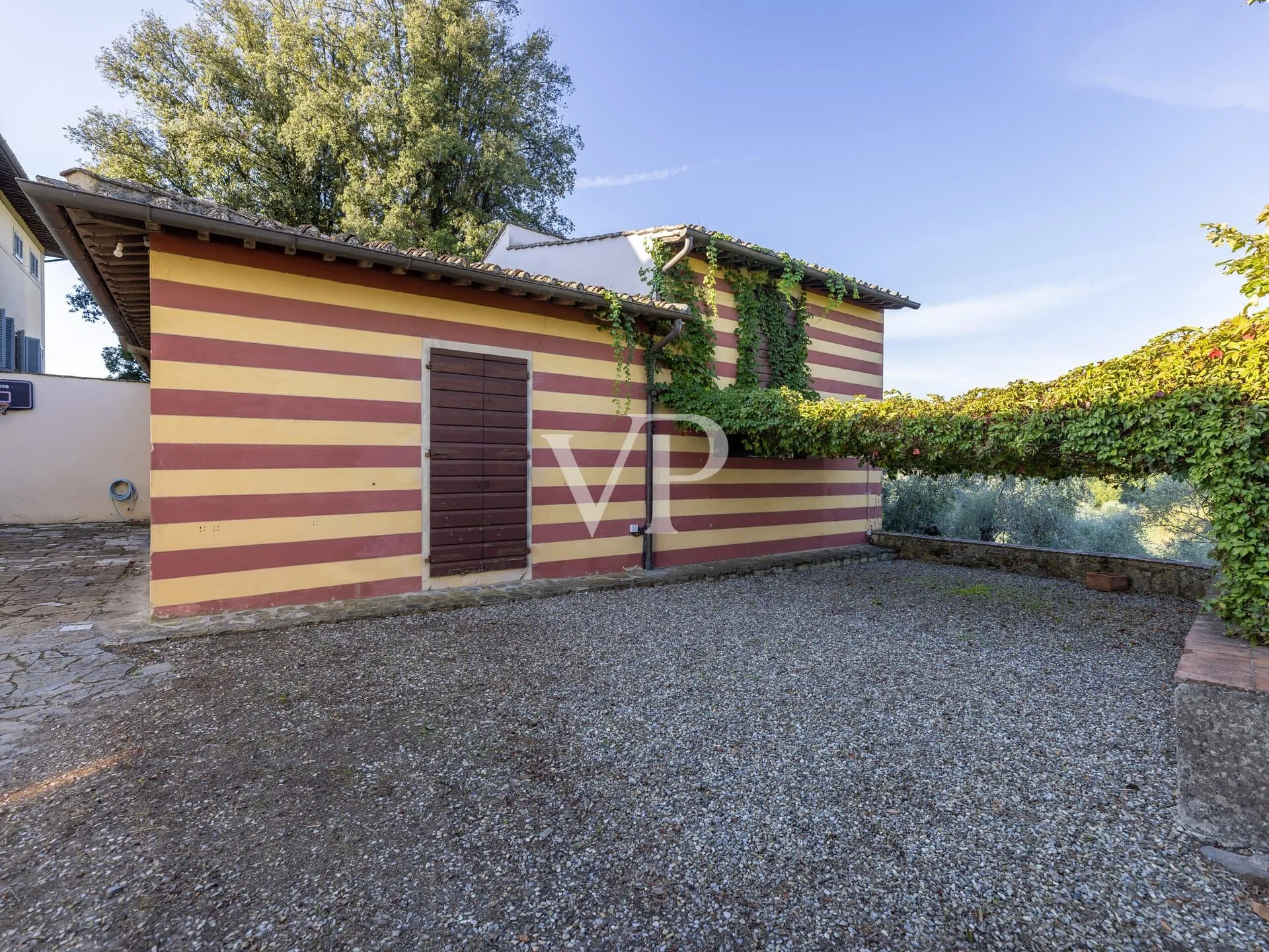 Finca de prestigio con villa, almazara y piscina panorámica a las afueras de Florencia