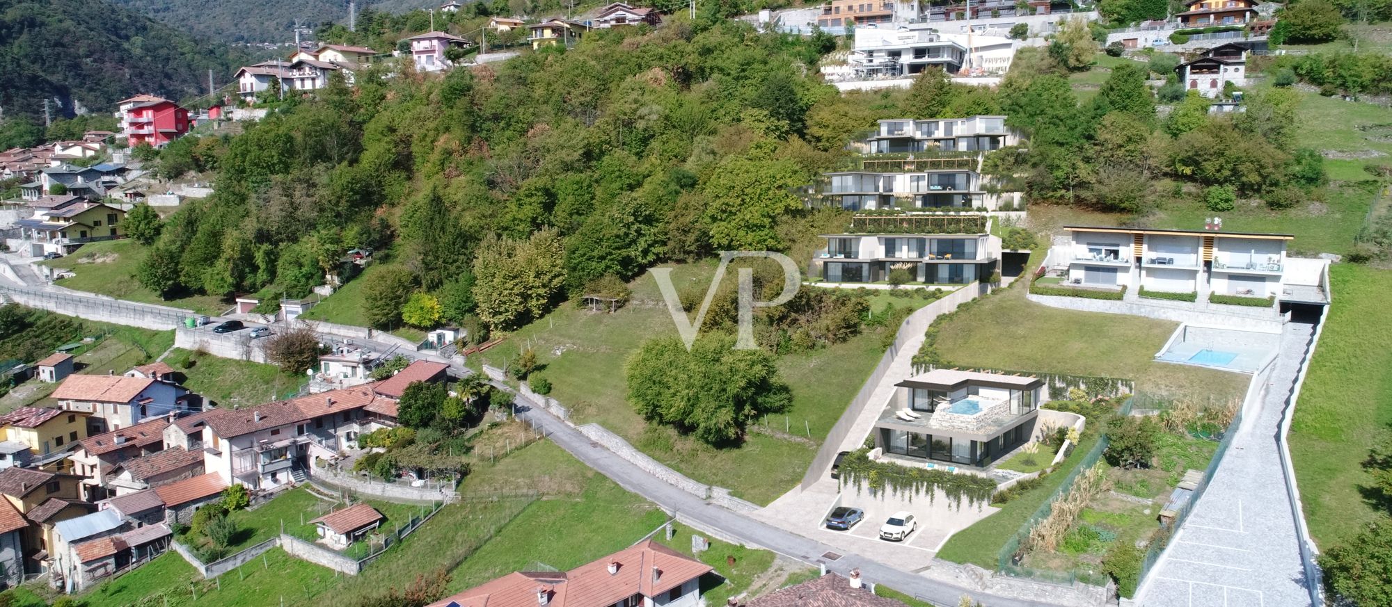 Prestigeträchtiges Wohnprojekt mit 12 Wohnungen und Villa in Vercana mit spektakulärem Blick auf den Comer See