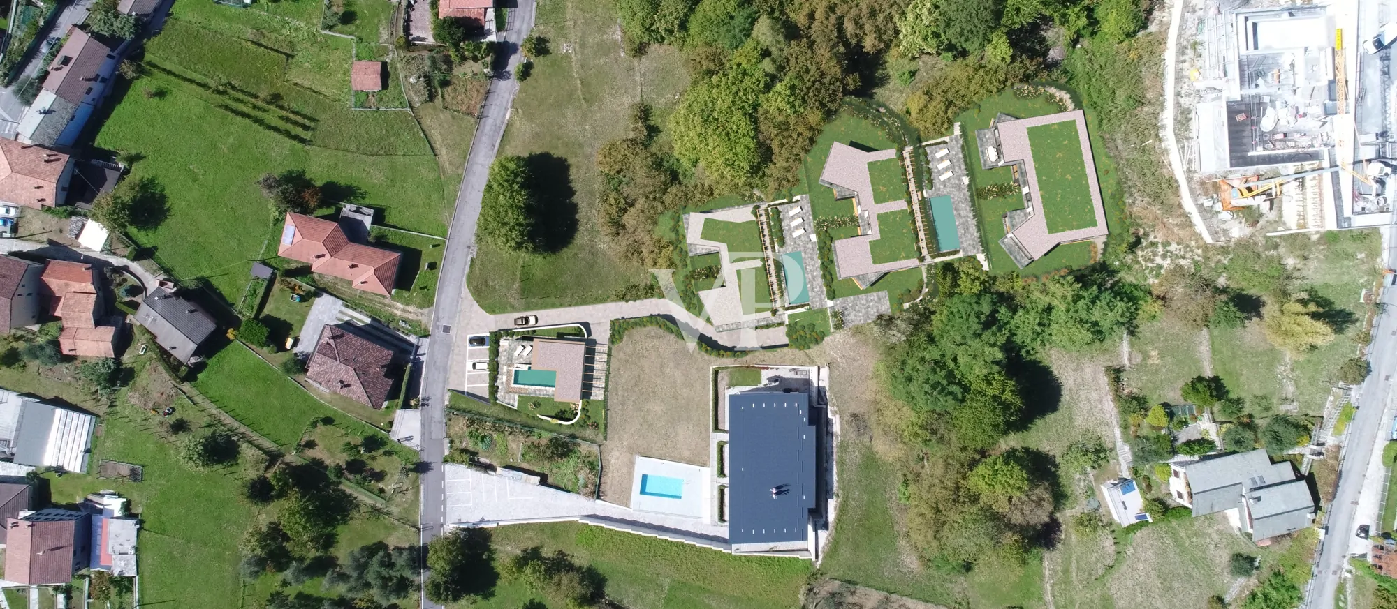 Prestigeträchtiges Wohnprojekt mit 12 Wohnungen und Villa in Vercana mit spektakulärem Blick auf den Comer See