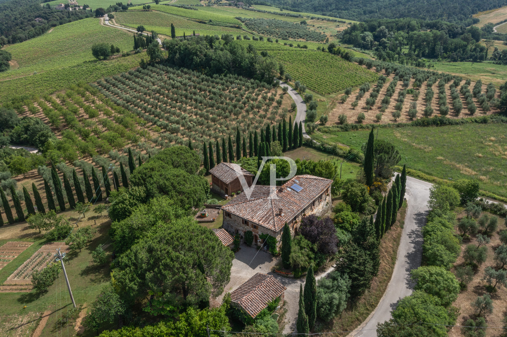 Chianti, Tuscany: magnificent historic estate with independent villa and two outbuildings surrounded by greenery