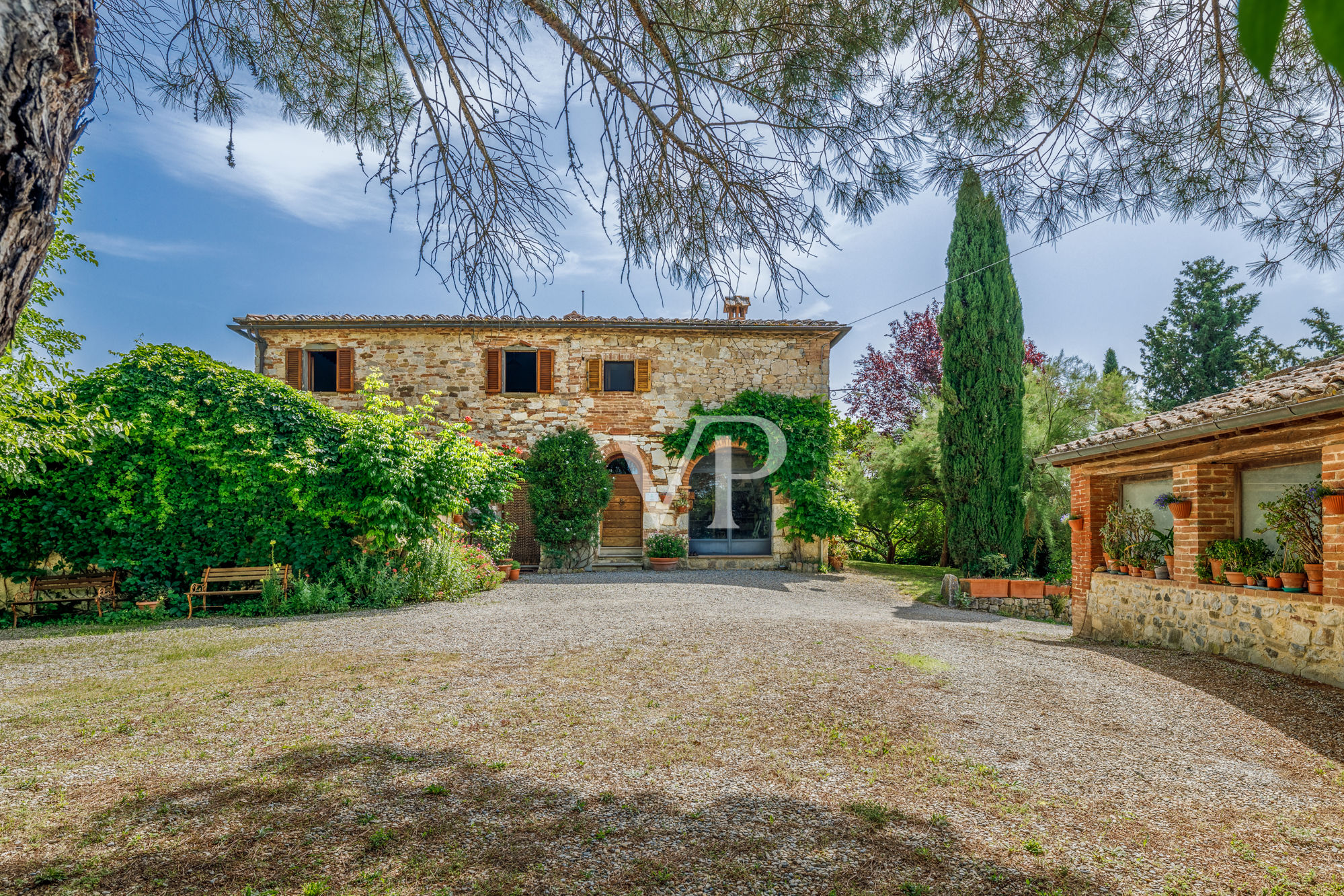 Chianti, Tuscany: magnificent historic estate with independent villa and two outbuildings surrounded by greenery
