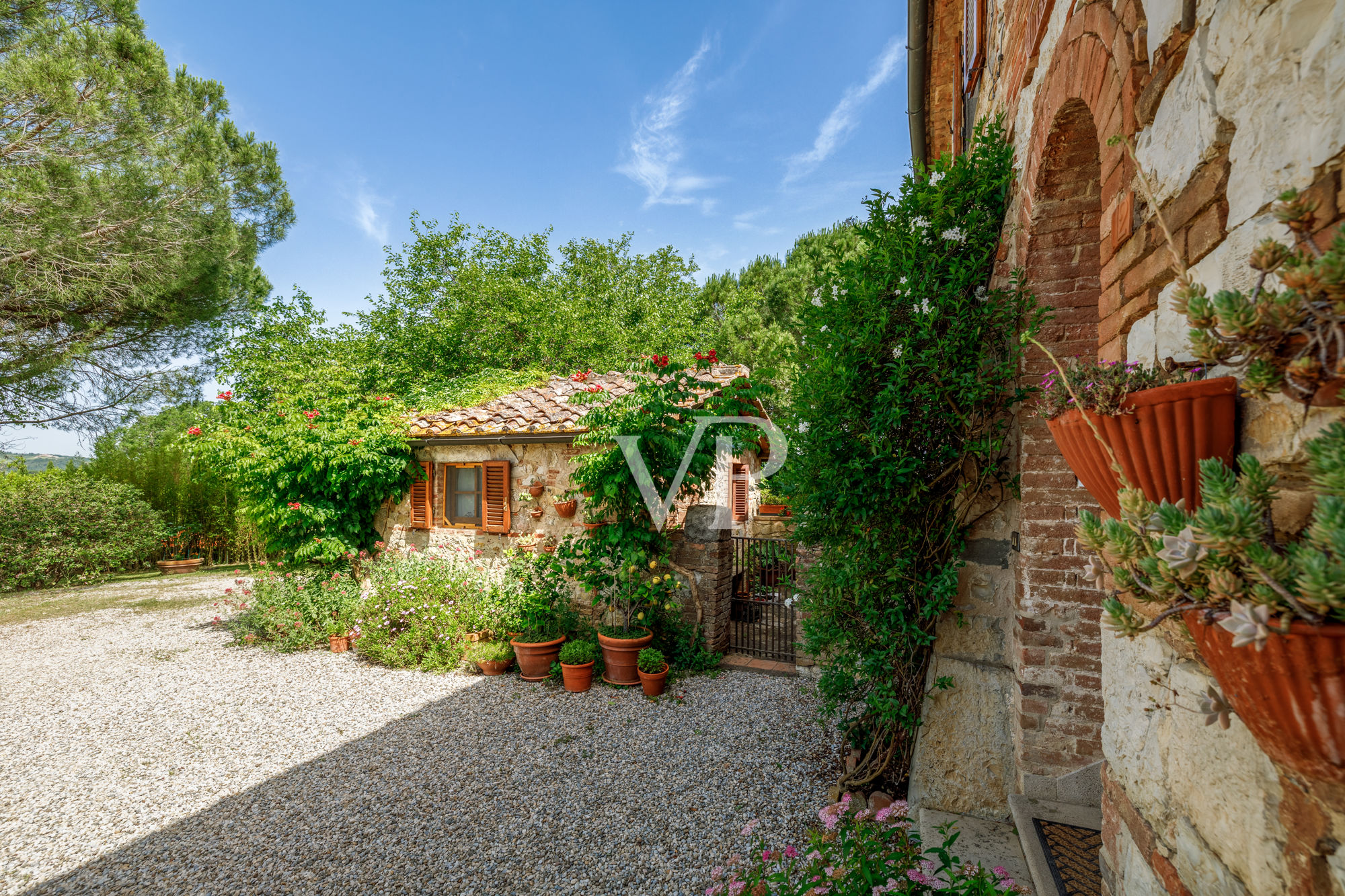 Chianti, Tuscany: magnificent historic estate with independent villa and two outbuildings surrounded by greenery