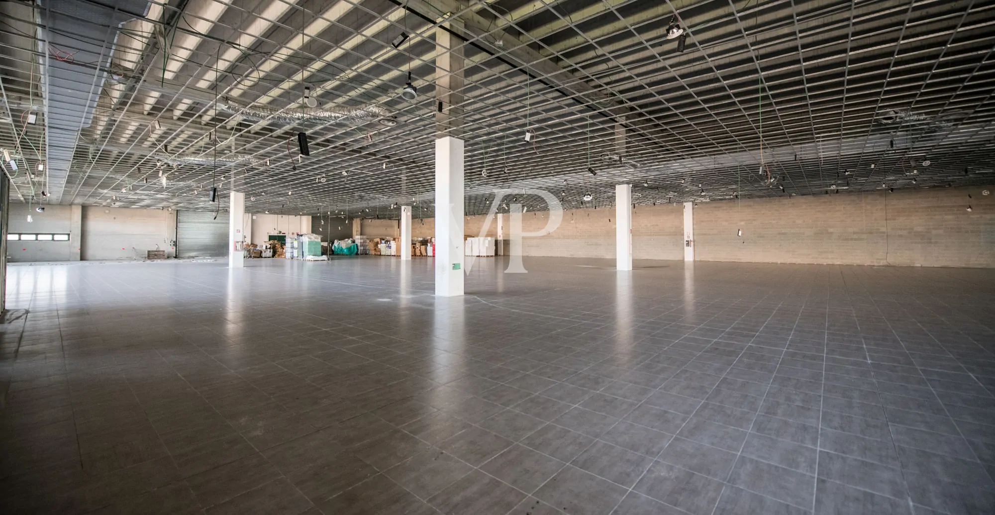 Commercial shed with outdoor area and underground garage