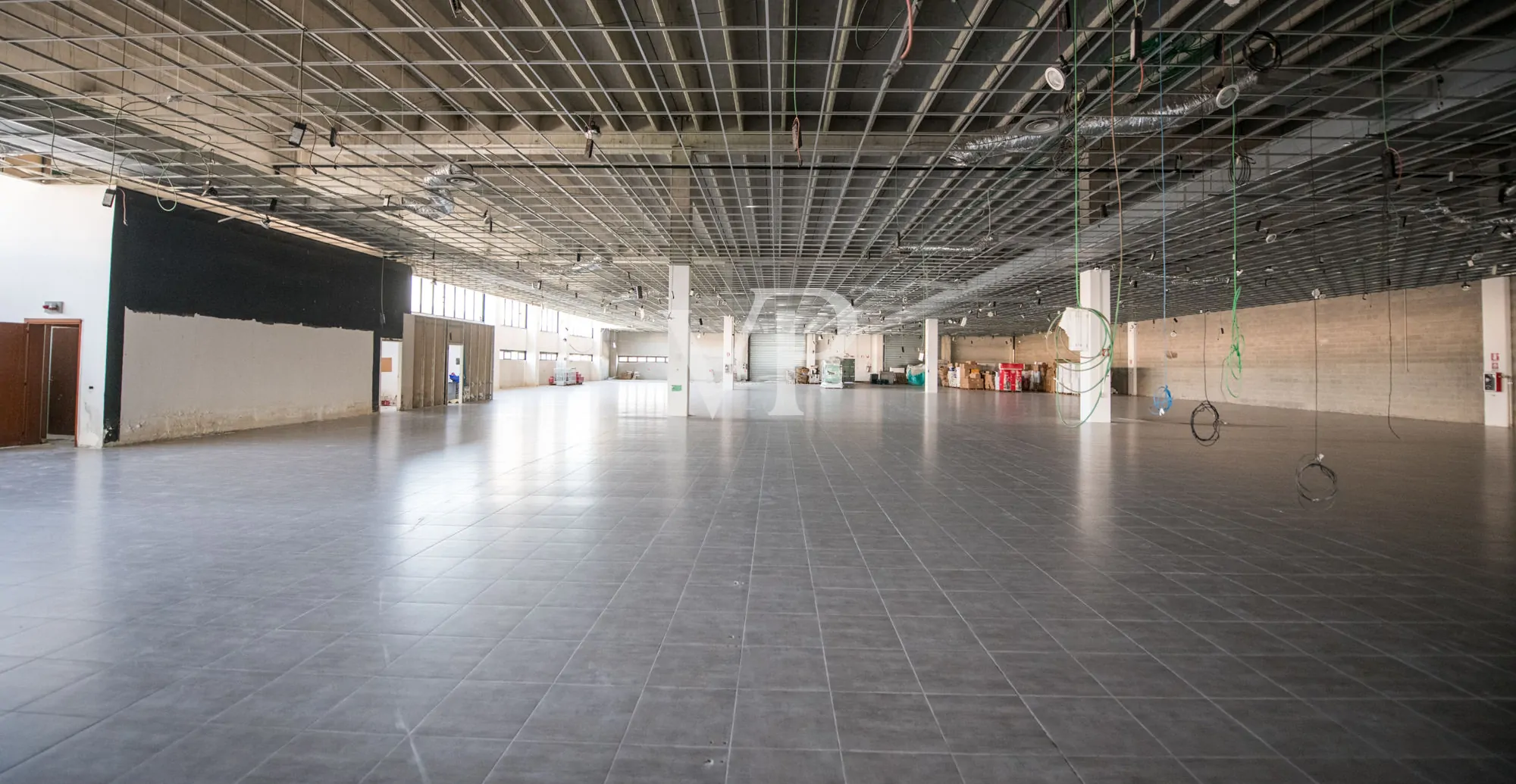Commercial shed with outdoor area and underground garage