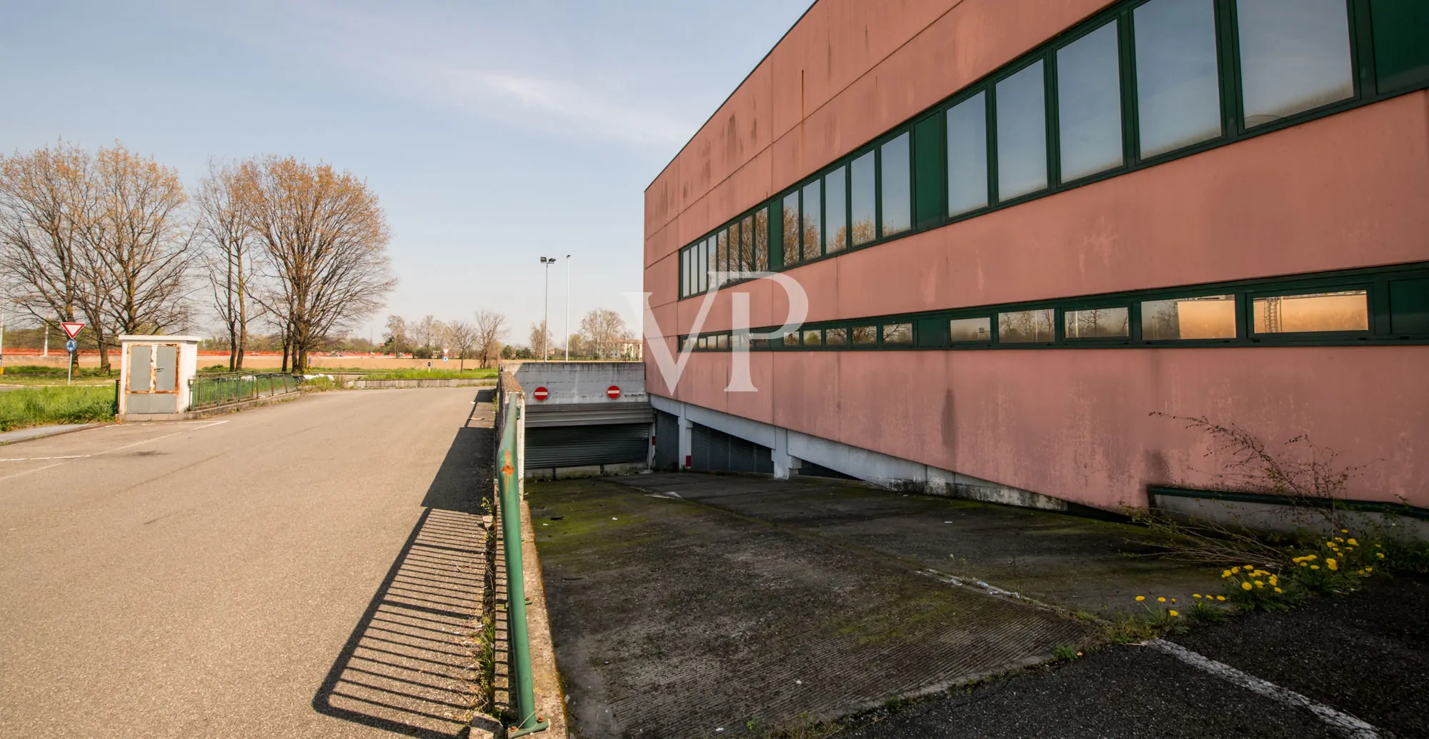 Commercial shed with outdoor area and underground garage