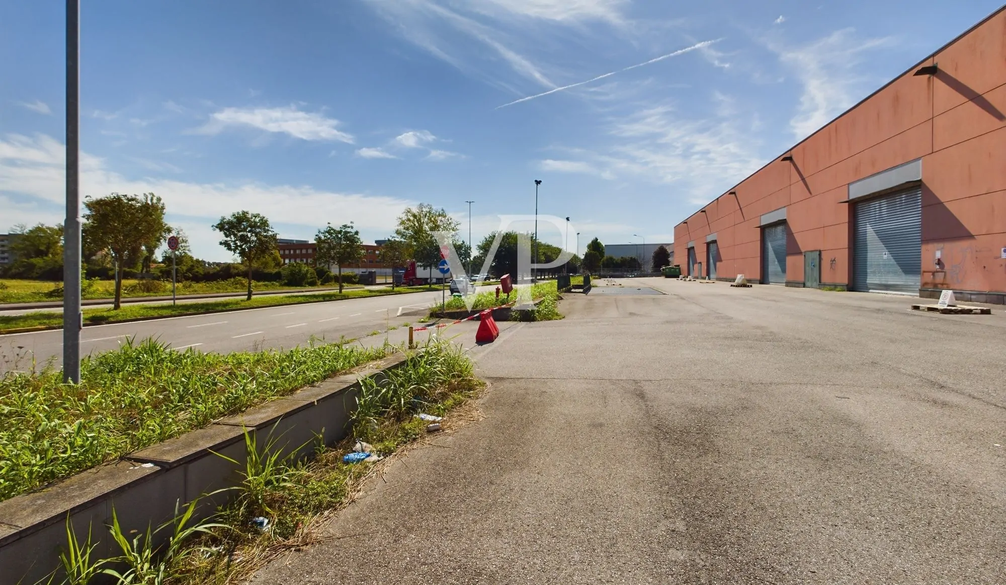 Commercial shed with outdoor area and underground garage