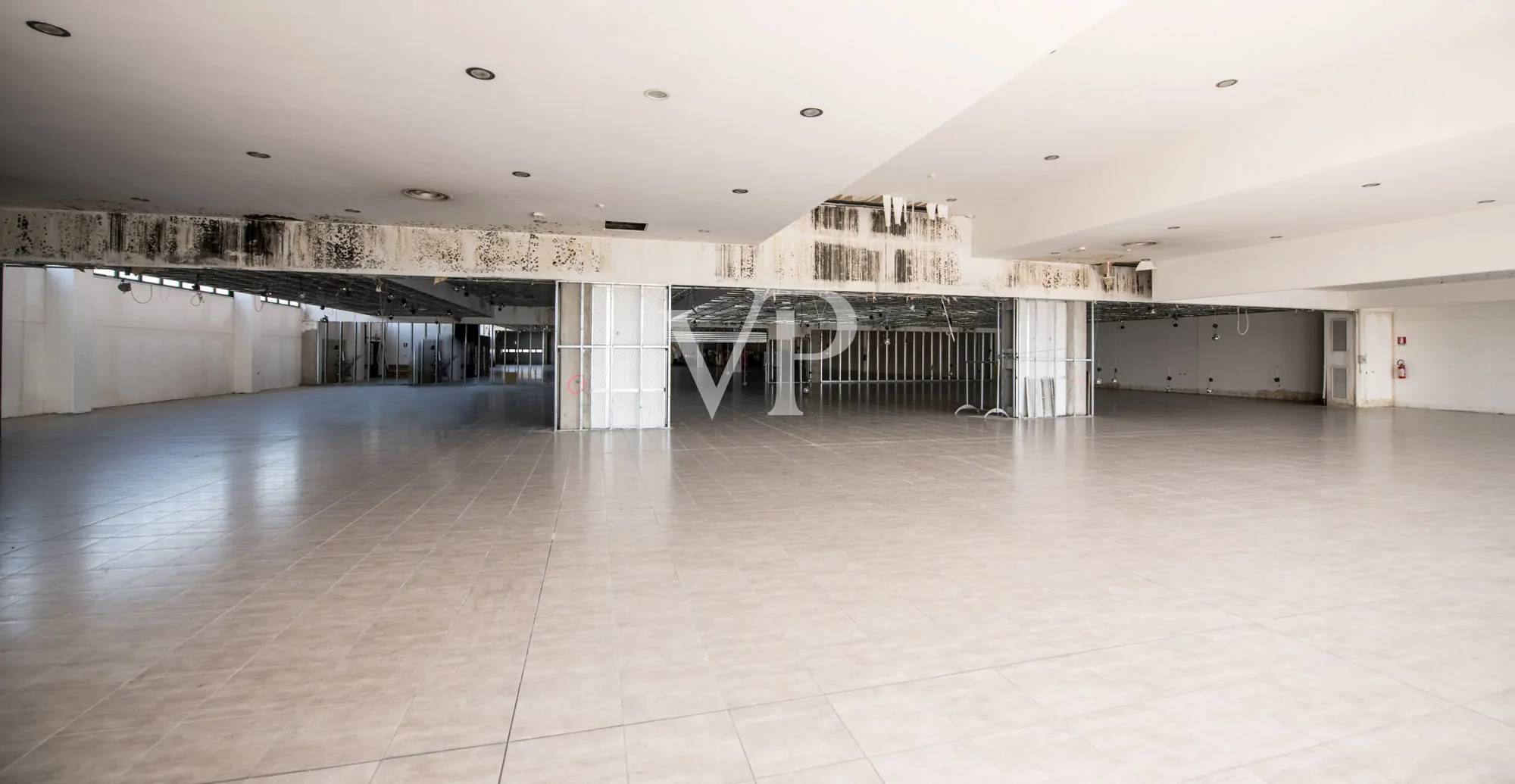 Commercial shed with outdoor area and underground garage