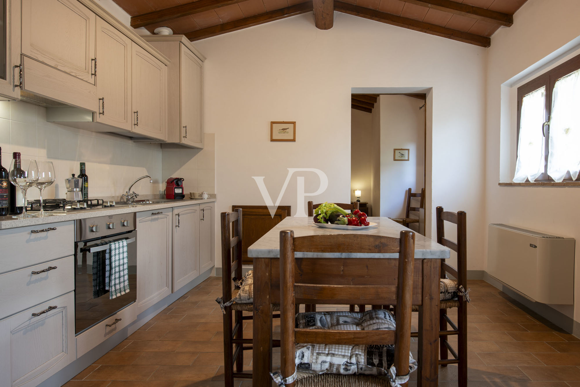 Finely restored farmhouse with vineyard in Montalcino