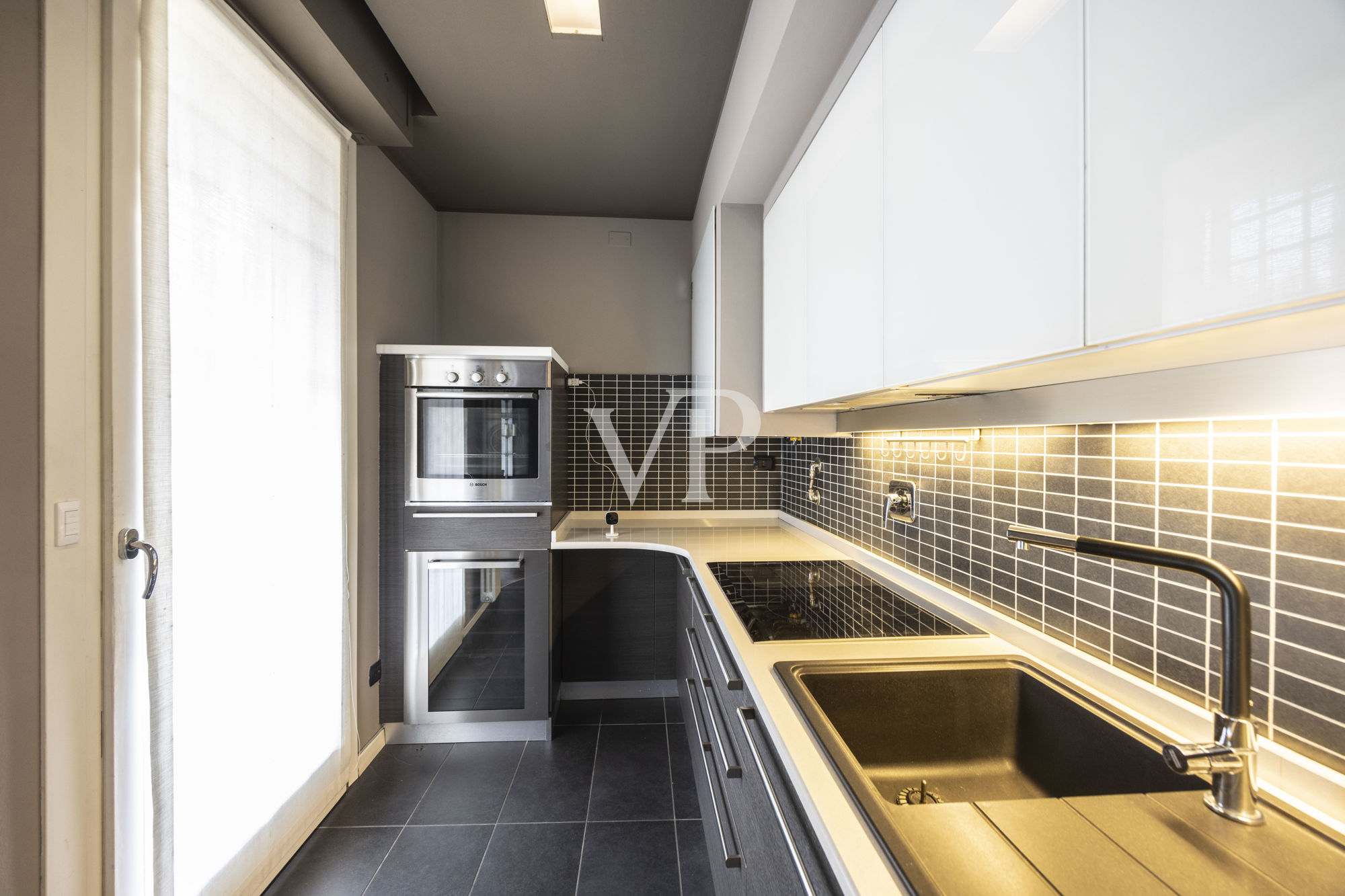 Renovierte Wohnung mit Terrassen und privatem Garten