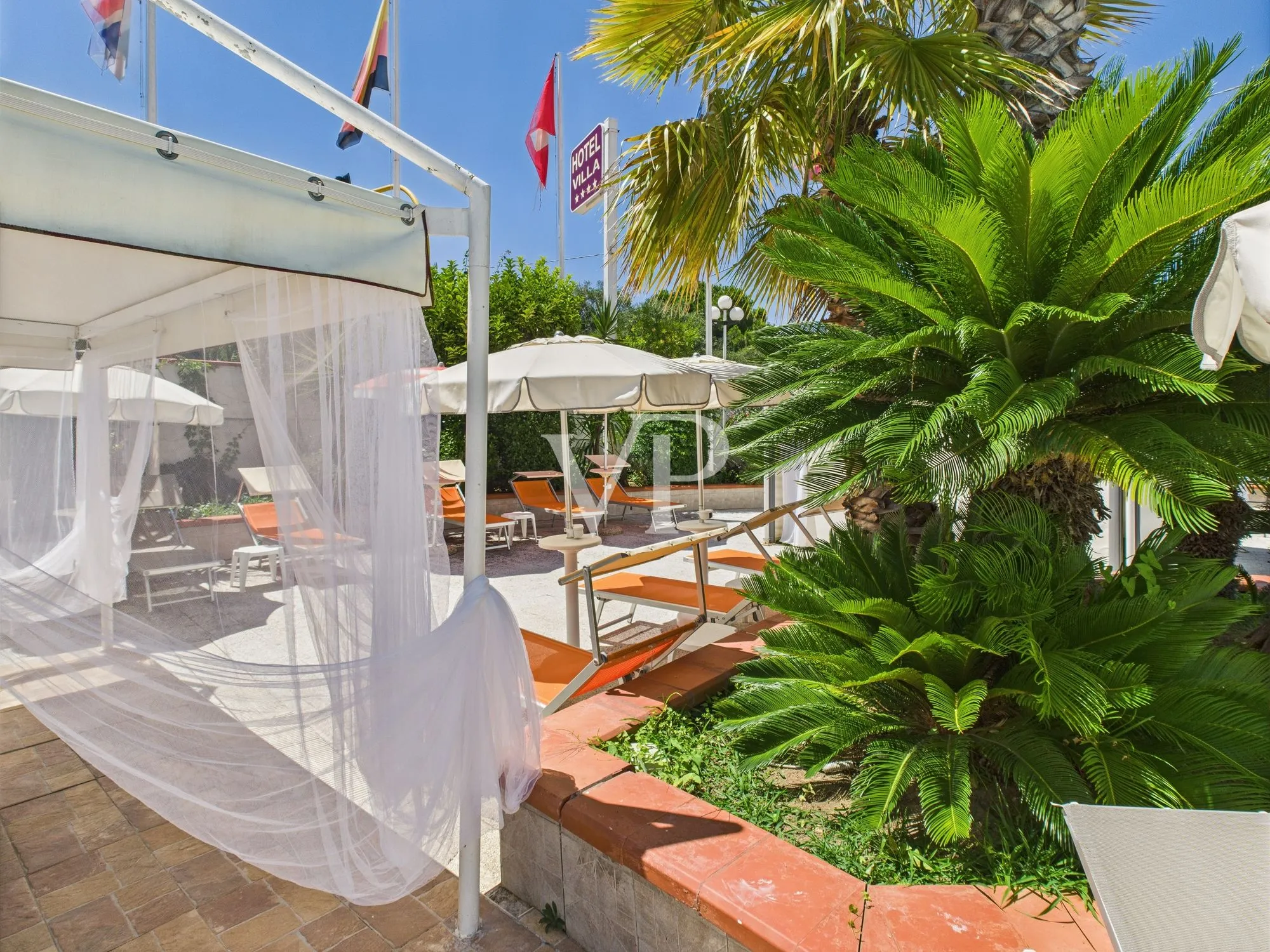Aktivhotel mit Schwimmbad und tropischem Garten
