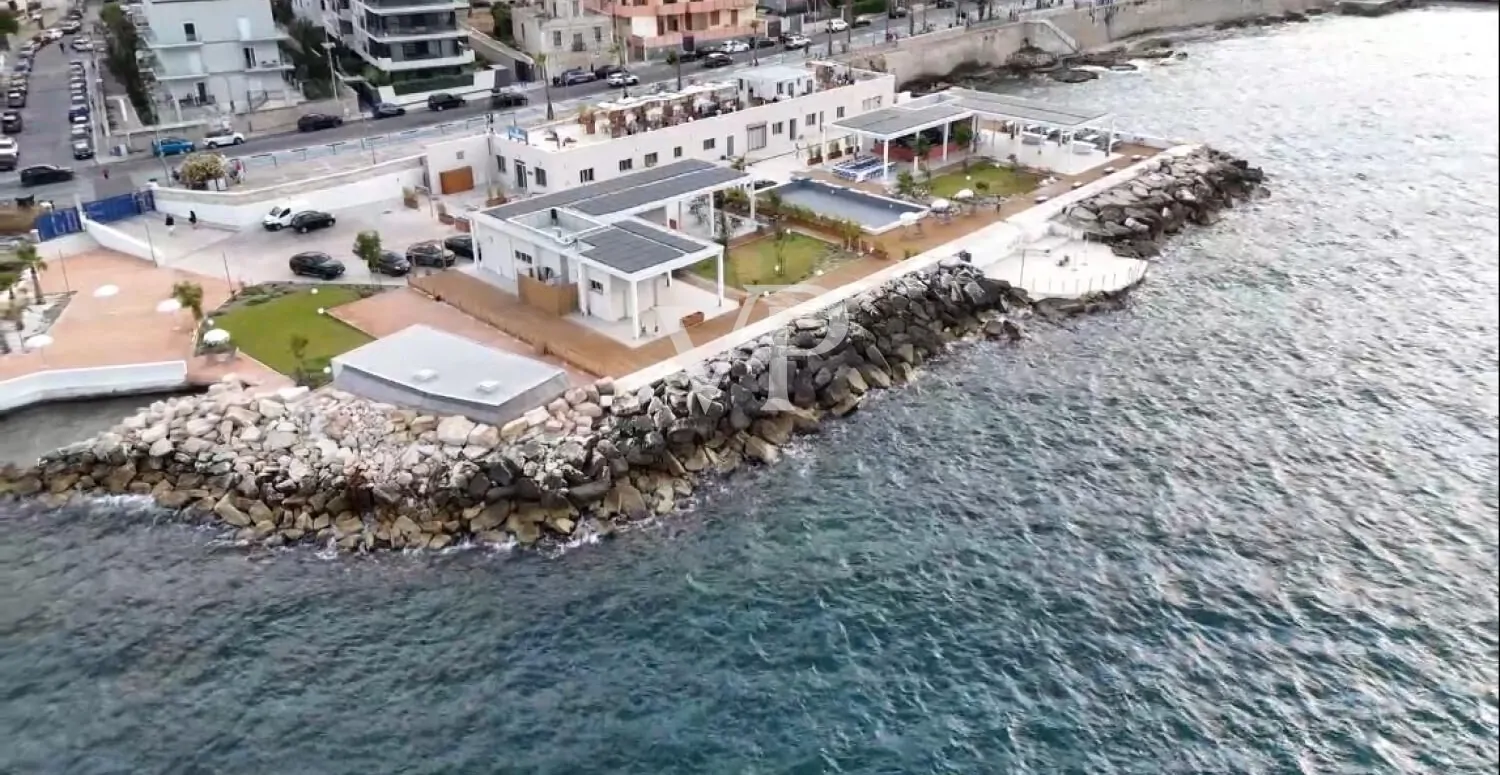 Unique commercial complex with bar, restaurant, and fish market in an exclusive location on the waterfront
