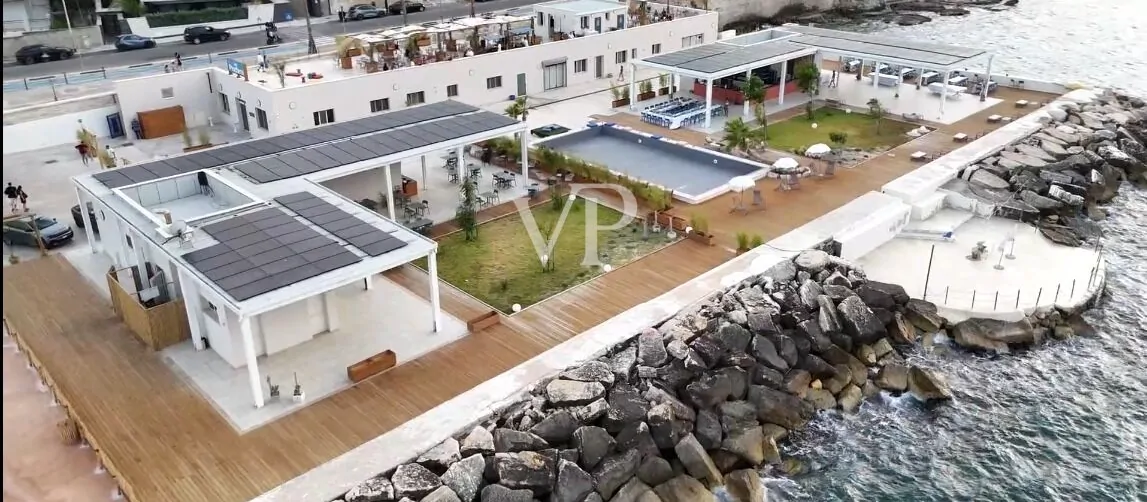 Unique commercial complex with bar, restaurant, and fish market in an exclusive location on the waterfront