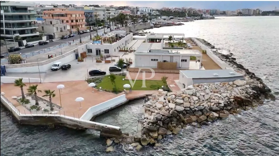 Unique commercial complex with bar, restaurant, and fish market in an exclusive location on the waterfront