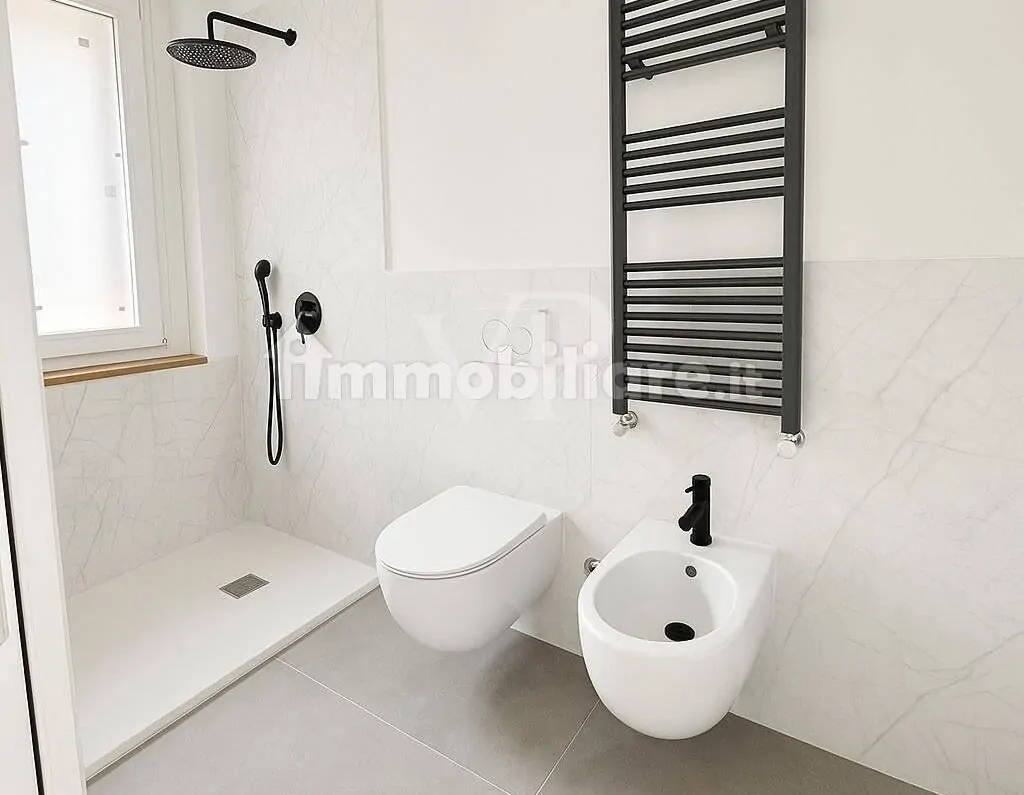 Quadrilocale finemente ristrutturato con due balconi