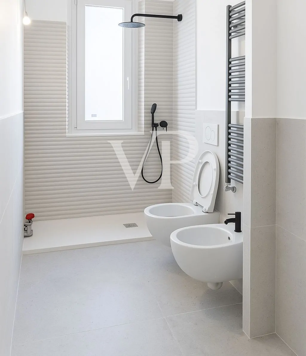 Quadrilocale finemente ristrutturato con due balconi