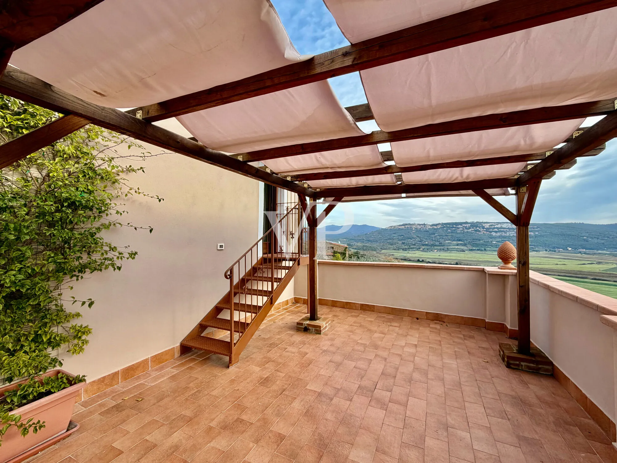 Renovated farmhouse with panoramic views of Massa Marittima and private garden in Tuscan Maremma