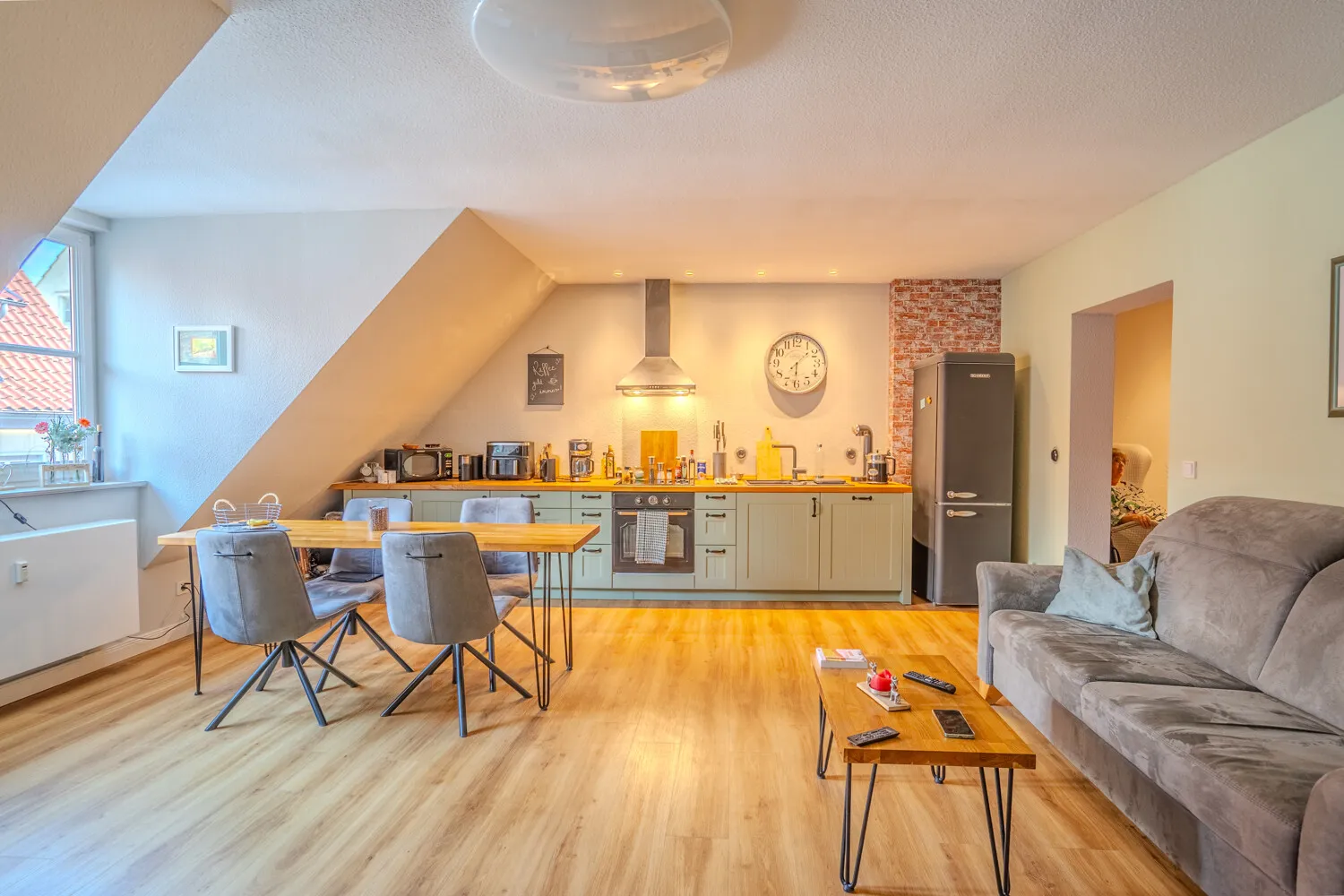 Wohnzimmer mit Küche