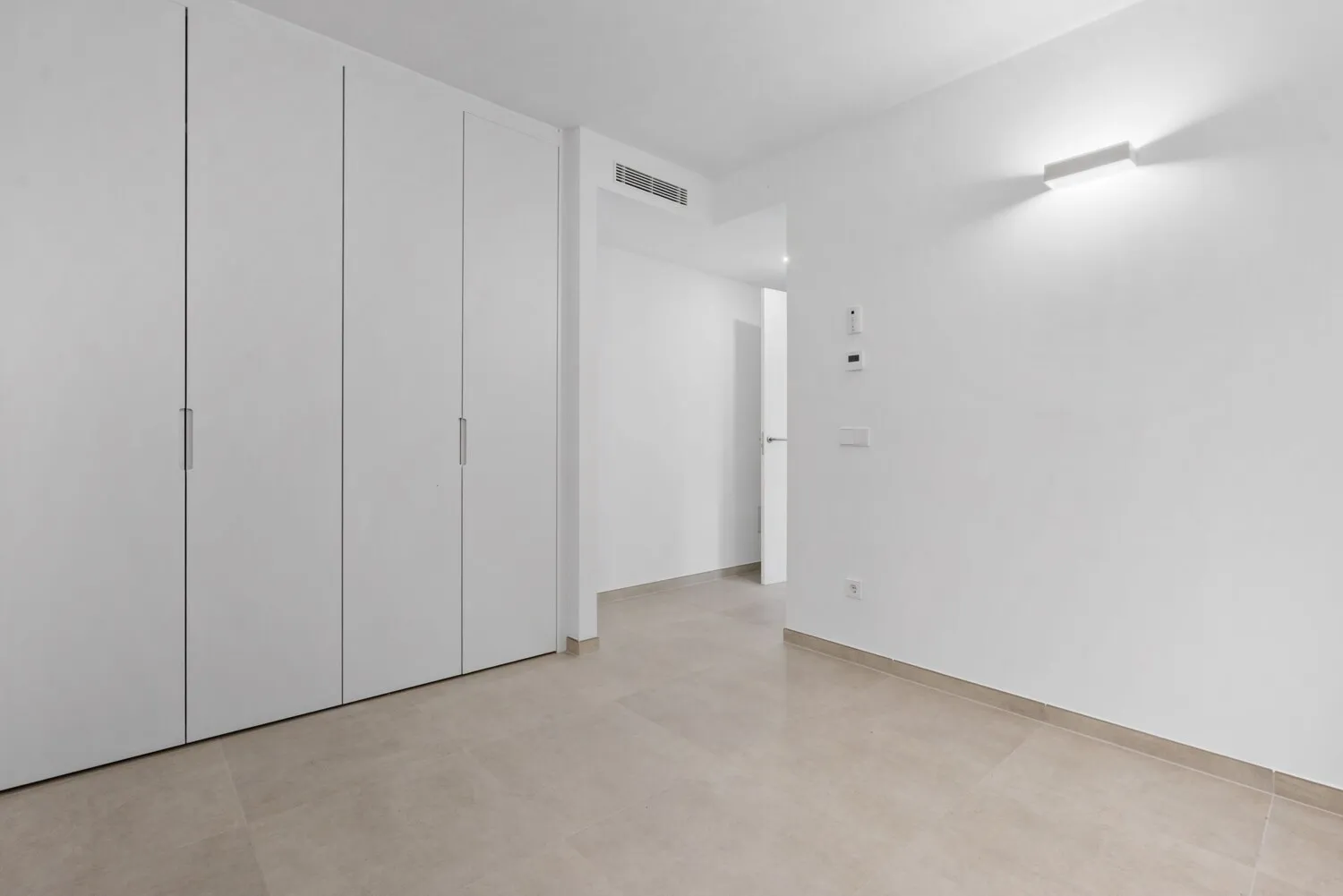 Bedroom with built-in wardrobes