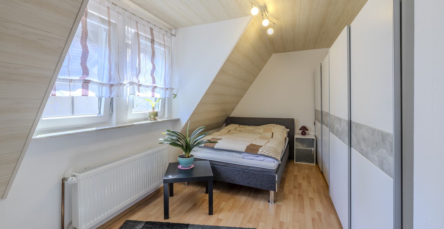 Kinder- oder Gästezimmer im Dachgeschoss