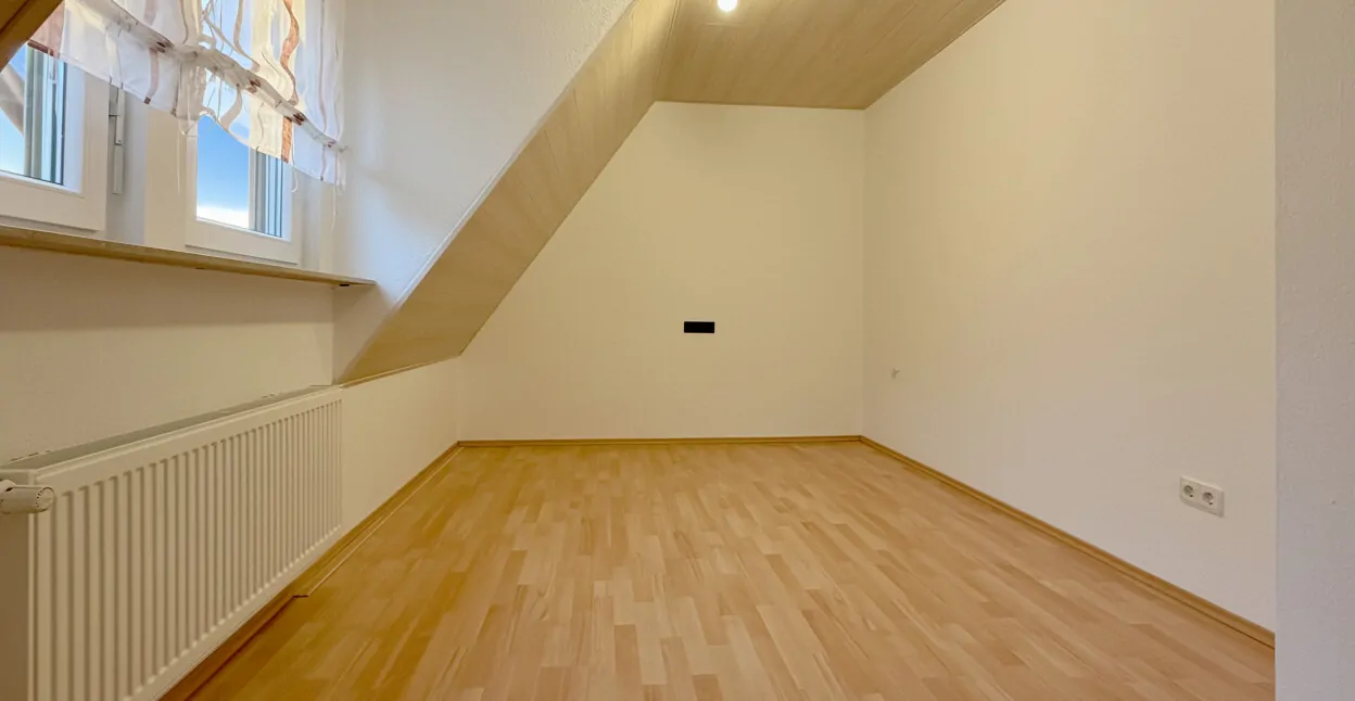 Kinder- oder Gästezimmer im Dachgeschoss