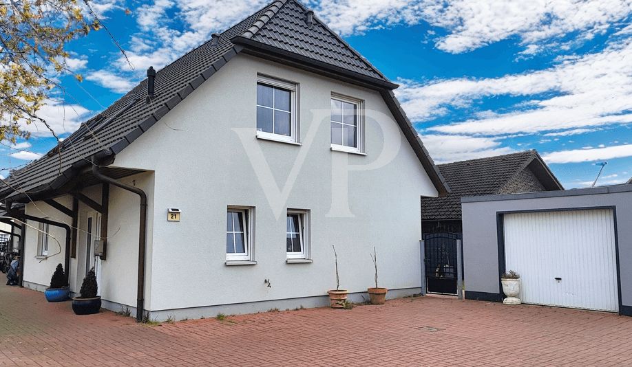 Familientraum in Issum-Sevelen: Modernes Wohnglück mit Sonnenterrasse und Garage