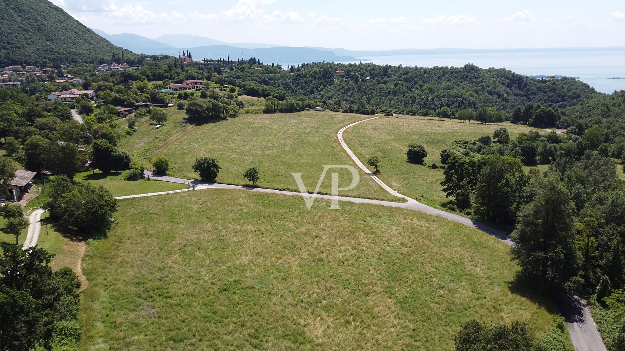 Productive land and forest with beautiful view of the lake in Salò