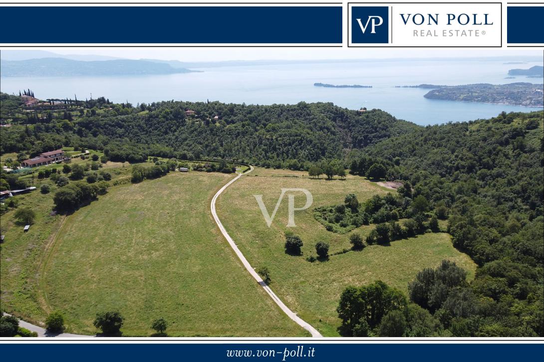 Terreno productivo y bosque con una hermosa vista del lago en Salò