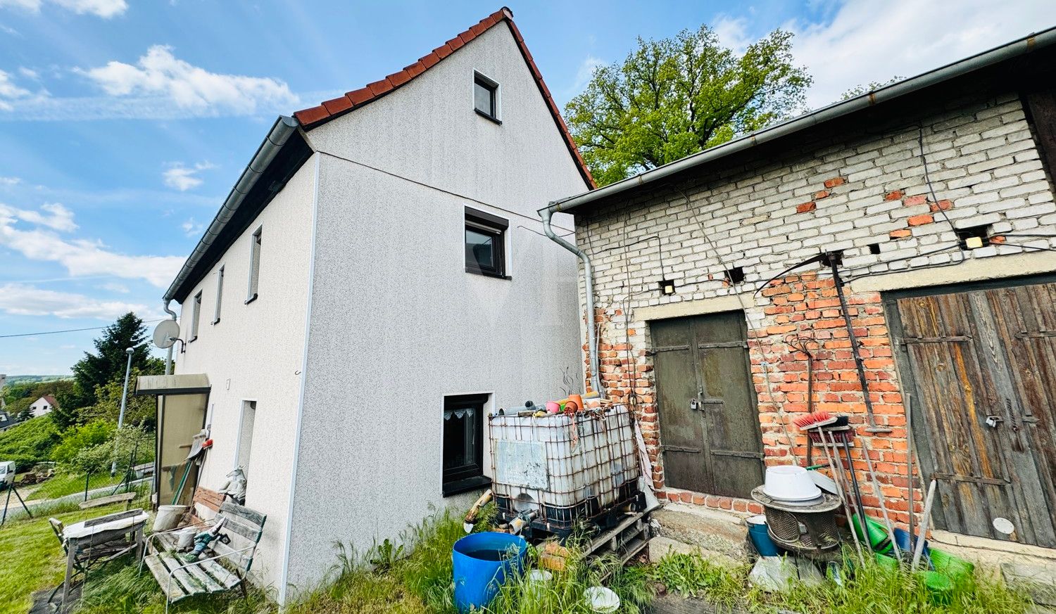 Haus mit Schuppen
