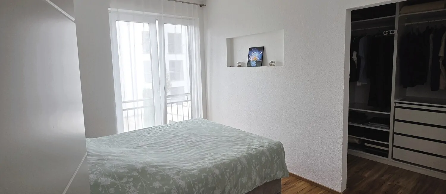 Schlafzimmer mit Ankleidezimmer