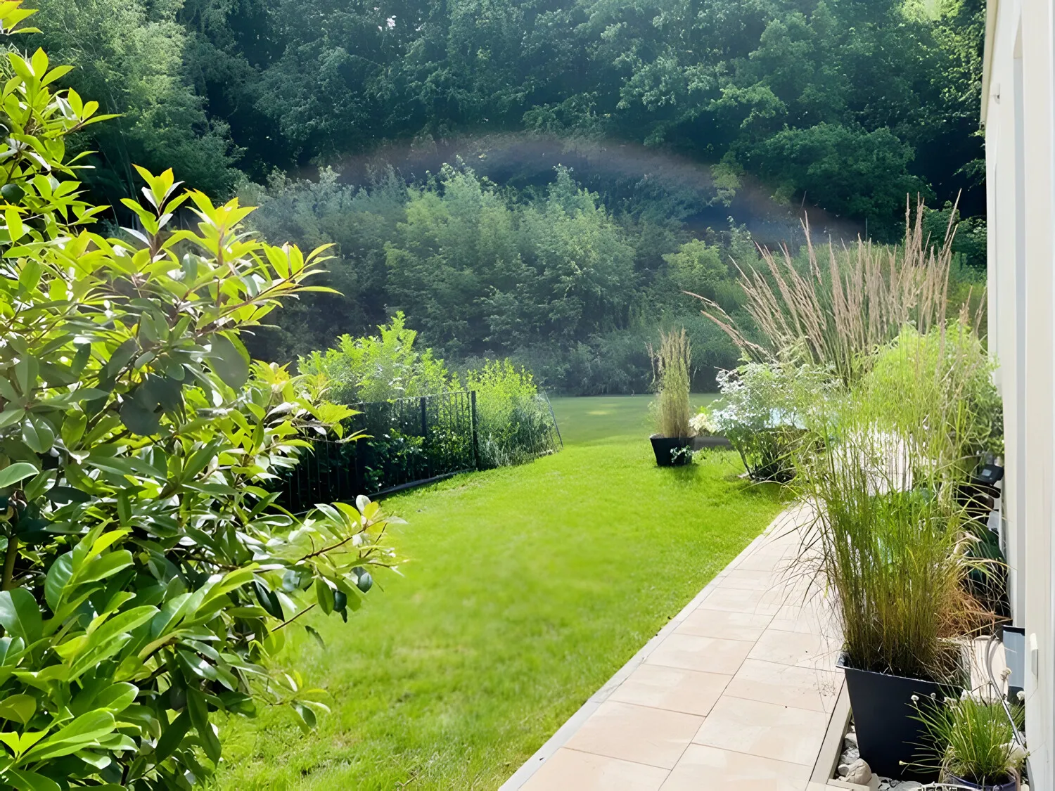 Austritt aus der Wohnung über den Balkon zum exklusiven Gartenanteil